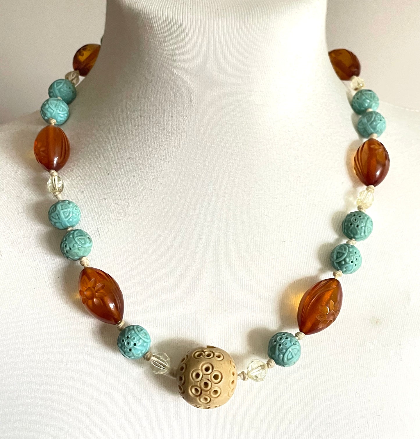 Vintage Art Deco moulded glass and carved cream galalith large bead necklace, pale blue, clear and citrine yellow / orange glass