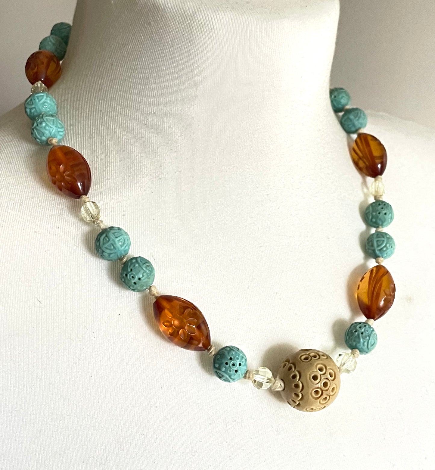 Vintage Art Deco moulded glass and carved cream galalith large bead necklace, pale blue, clear and citrine yellow / orange glass