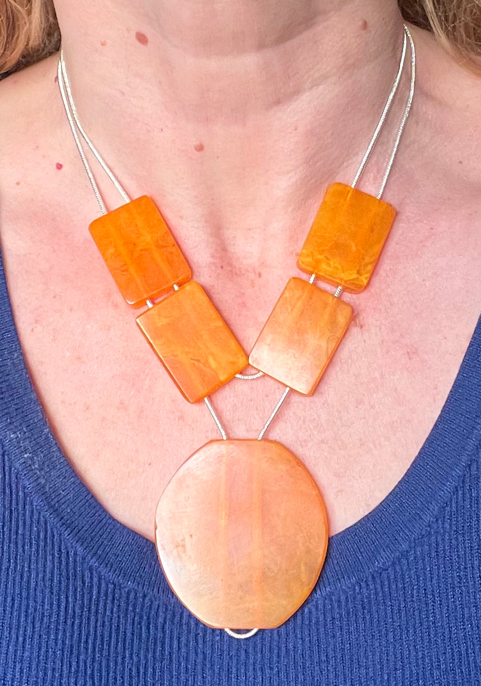 Vintage Art Deco marbled orange galalith huge bead necklace with double strand silver tone chrome machine age snake chains