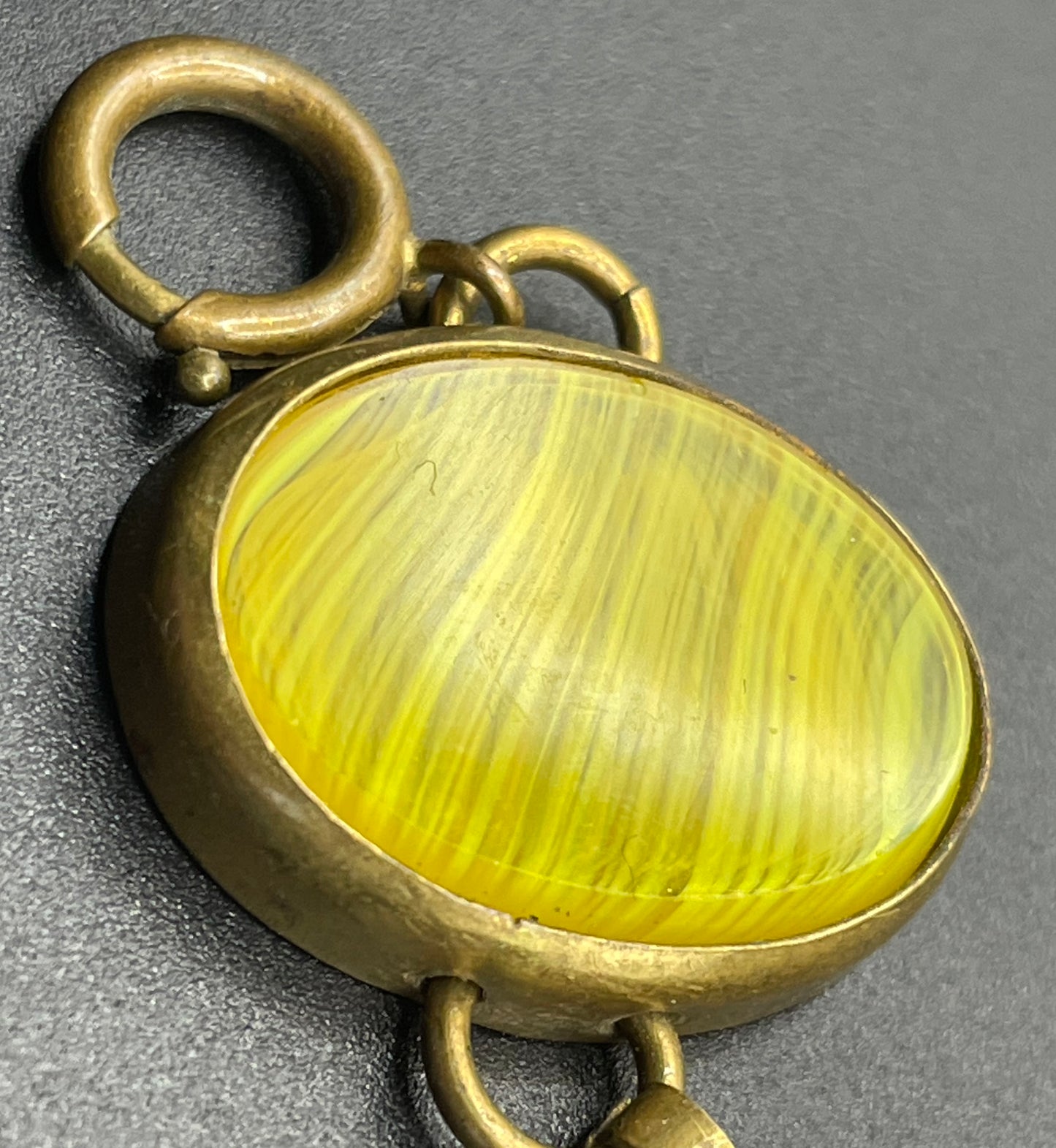 Vintage bright yellow marbled glass riviere collet set bracelet, bezel set, open backed large, oval banded glass stones, such unusual stones