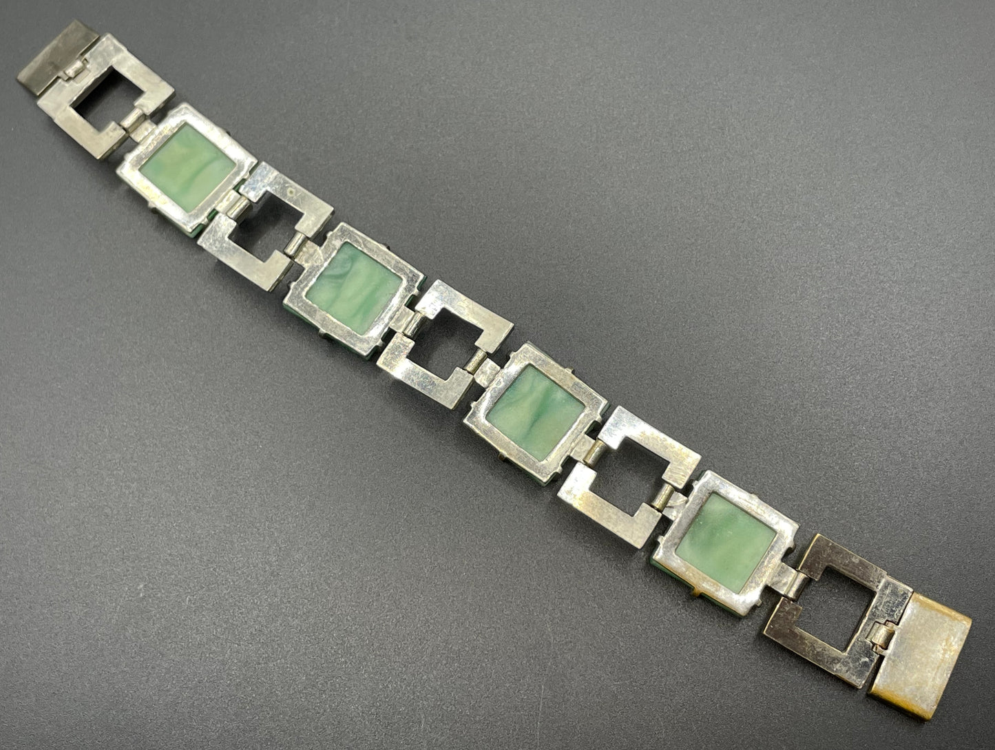Vintage Art Deco green moulded glass, clear paste rhinestone and silver tone cocktail bracelet