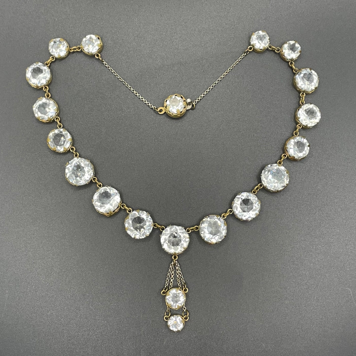 Antique paste riviere necklace, open backed gold tone brass settings, beautiful clear paste rhinestones, negligee pendant tassels