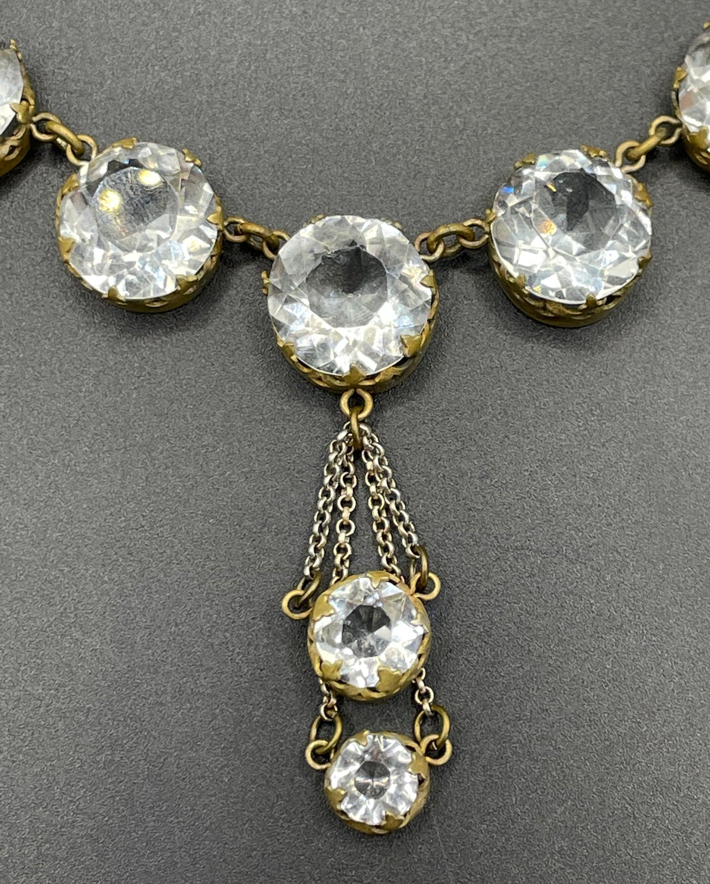 Antique paste riviere necklace, open backed gold tone brass settings, beautiful clear paste rhinestones, negligee pendant tassels