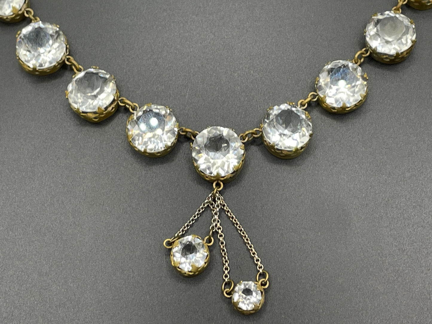 Antique paste riviere necklace, open backed gold tone brass settings, beautiful clear paste rhinestones, negligee pendant tassels