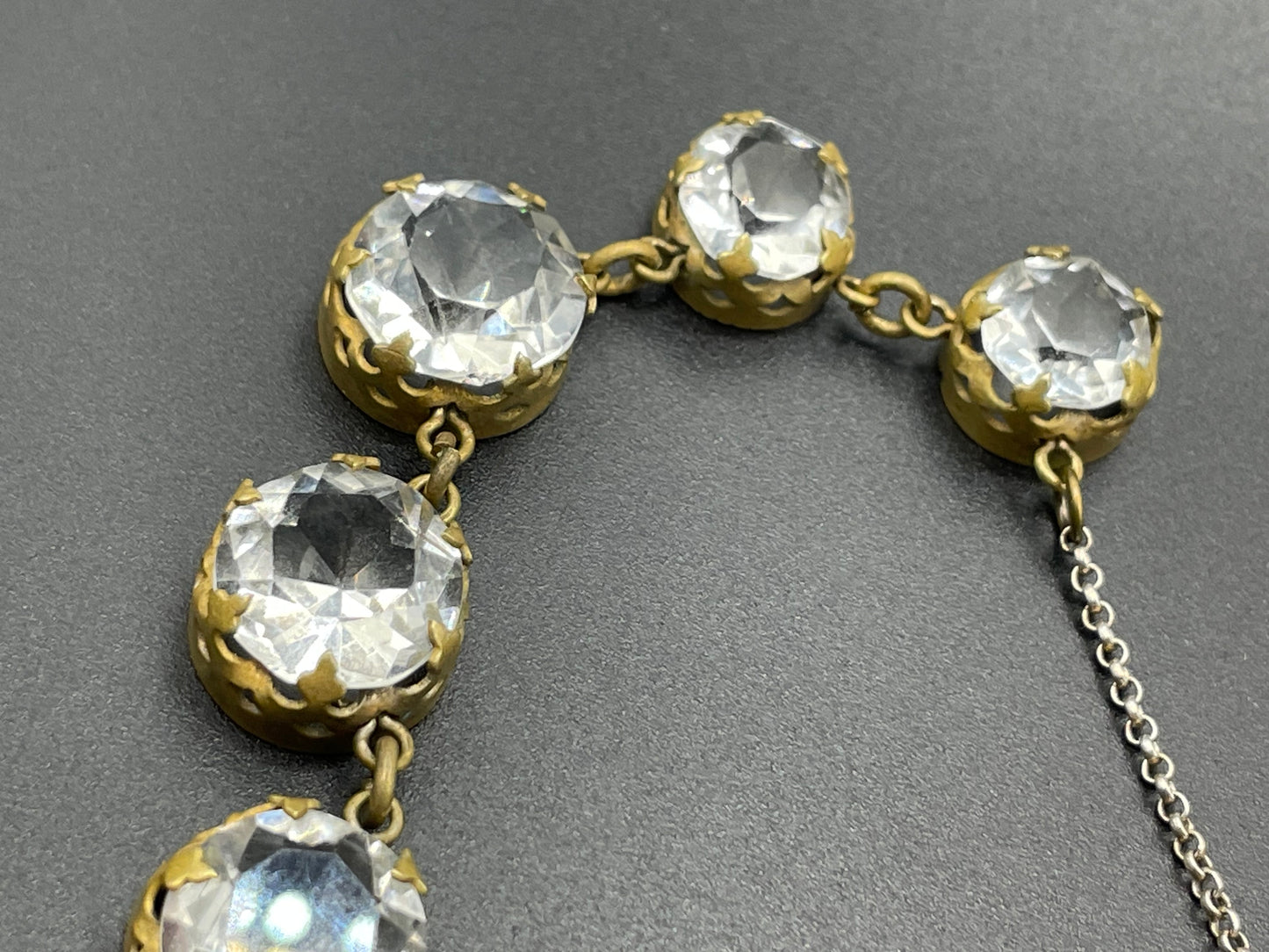 Antique paste riviere necklace, open backed gold tone brass settings, beautiful clear paste rhinestones, negligee pendant tassels