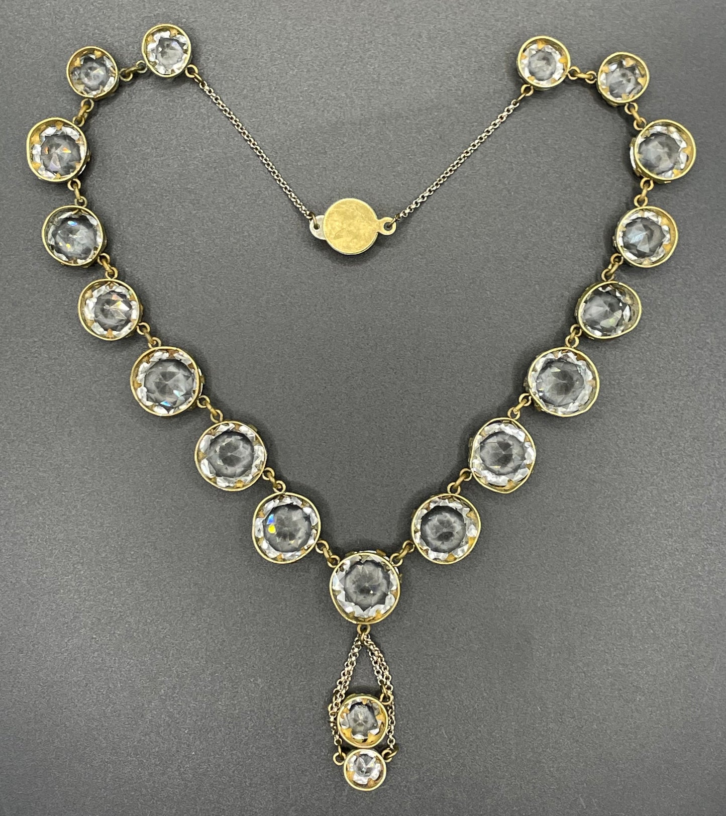 Antique paste riviere necklace, open backed gold tone brass settings, beautiful clear paste rhinestones, negligee pendant tassels