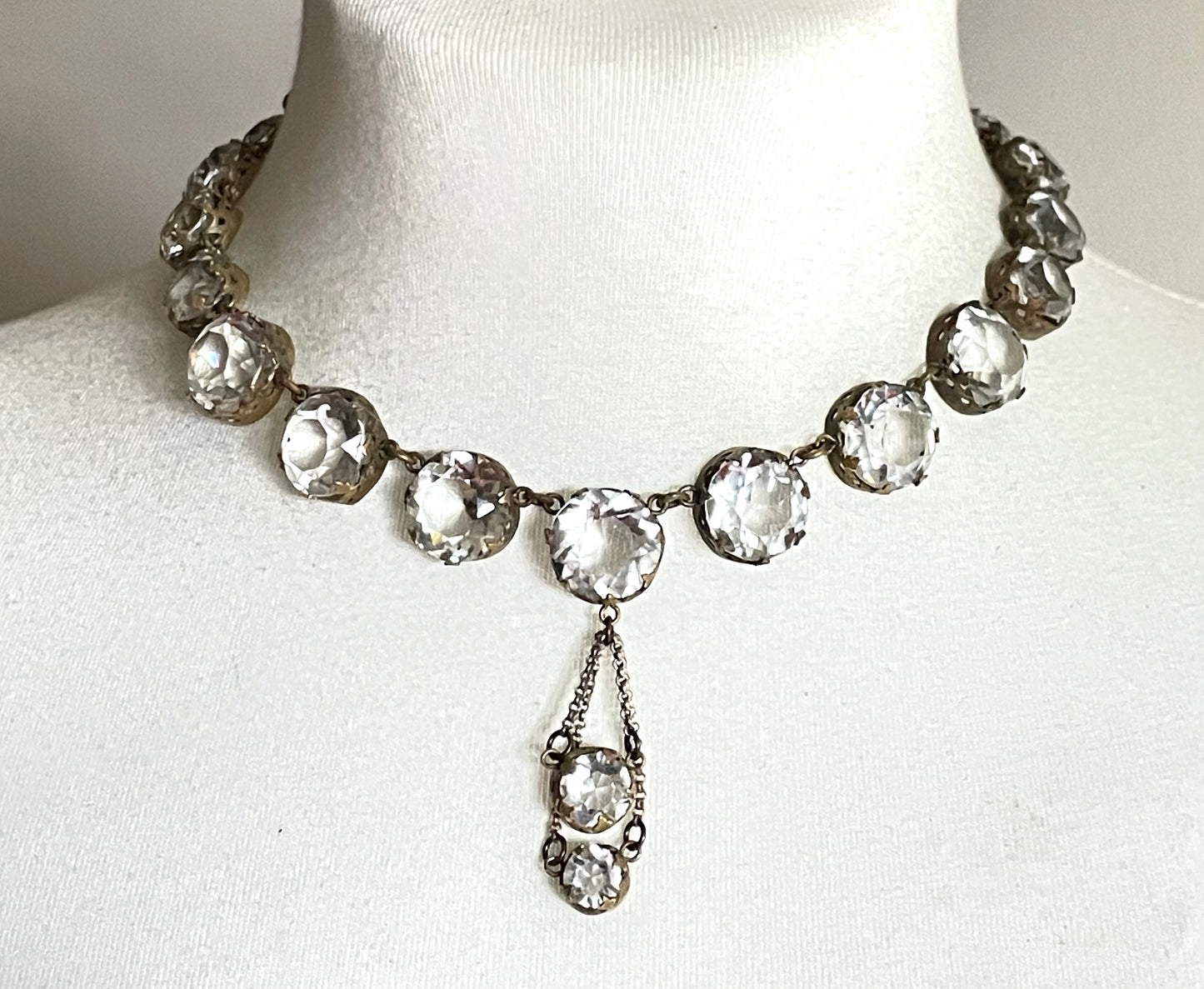 Antique paste riviere necklace, open backed gold tone brass settings, beautiful clear paste rhinestones, negligee pendant tassels