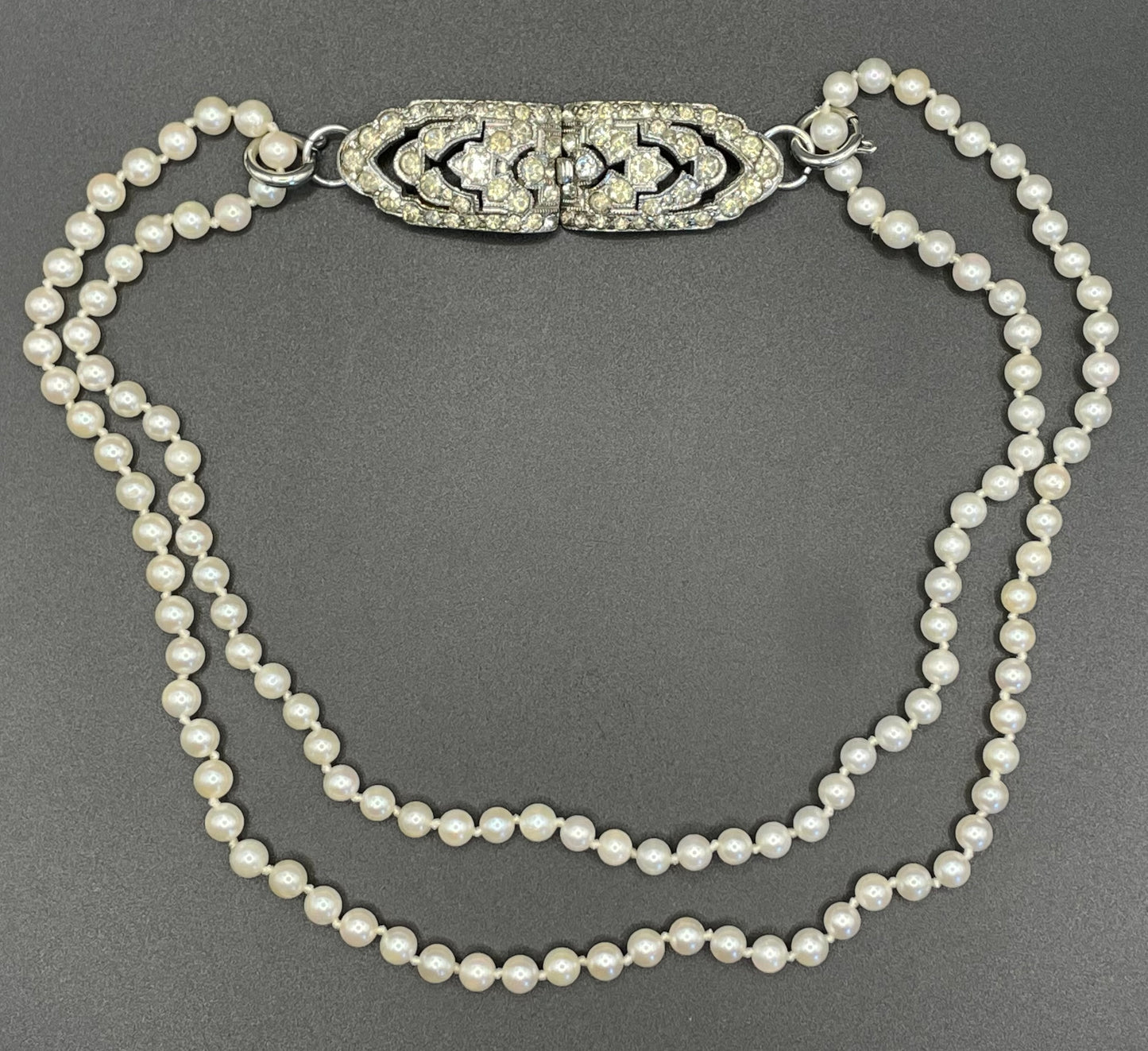 Vintage real cultured pearl necklace, longer length so can be worn as a double strand with the included vintage rhinestone necklace clip