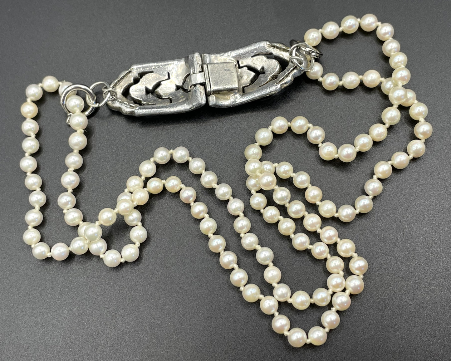Vintage real cultured pearl necklace, longer length so can be worn as a double strand with the included vintage rhinestone necklace clip