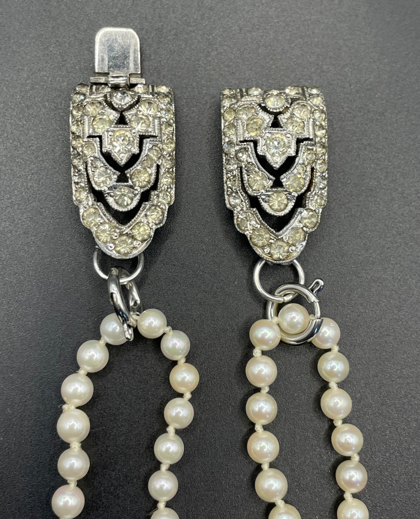 Vintage real cultured pearl necklace, longer length so can be worn as a double strand with the included vintage rhinestone necklace clip