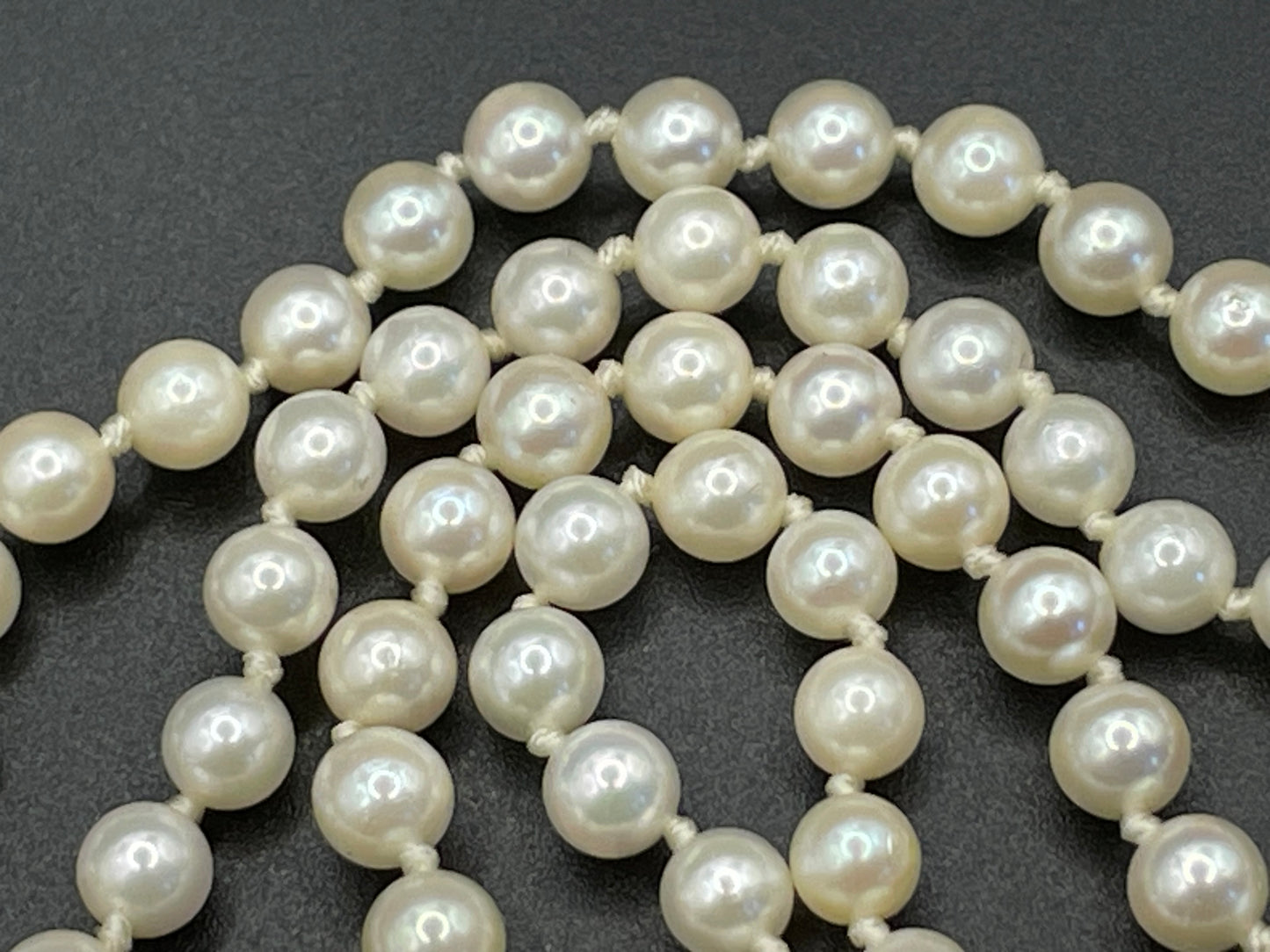 Vintage real cultured pearl necklace, longer length so can be worn as a double strand with the included vintage rhinestone necklace clip