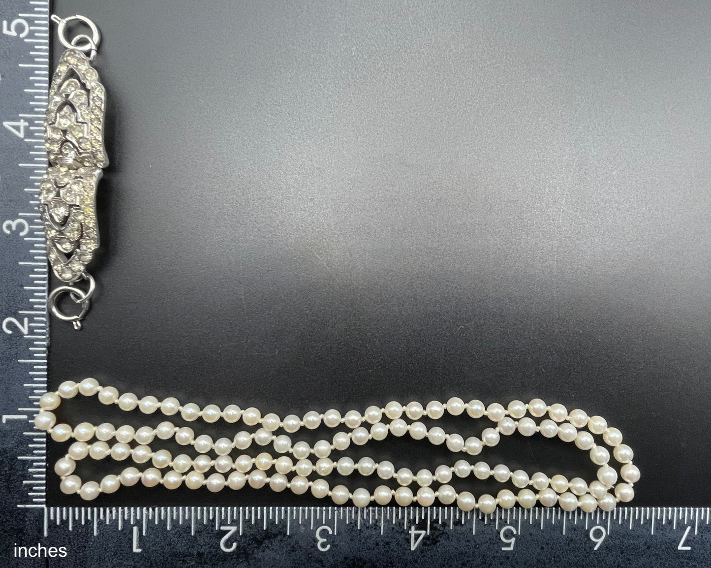 Vintage real cultured pearl necklace, longer length so can be worn as a double strand with the included vintage rhinestone necklace clip