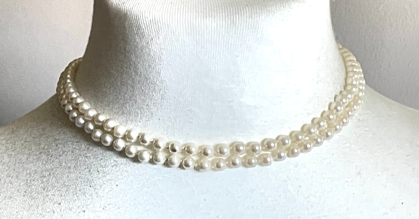 Vintage real cultured pearl necklace, longer length so can be worn as a double strand with the included vintage rhinestone necklace clip
