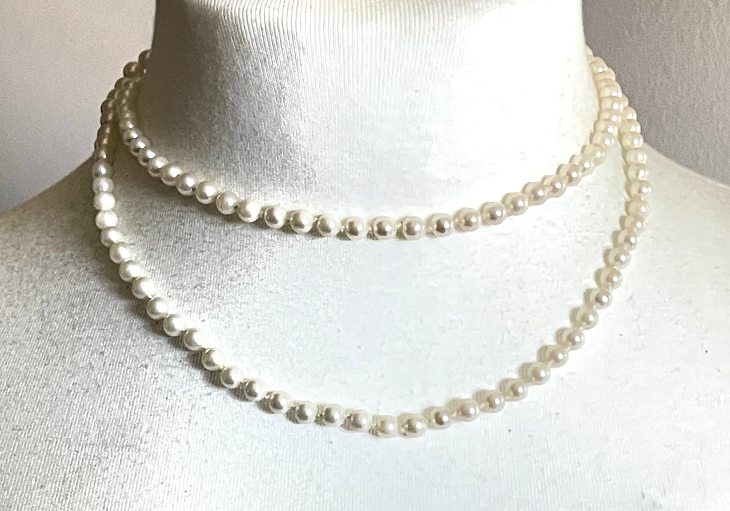 Vintage real cultured pearl necklace, longer length so can be worn as a double strand with the included vintage rhinestone necklace clip