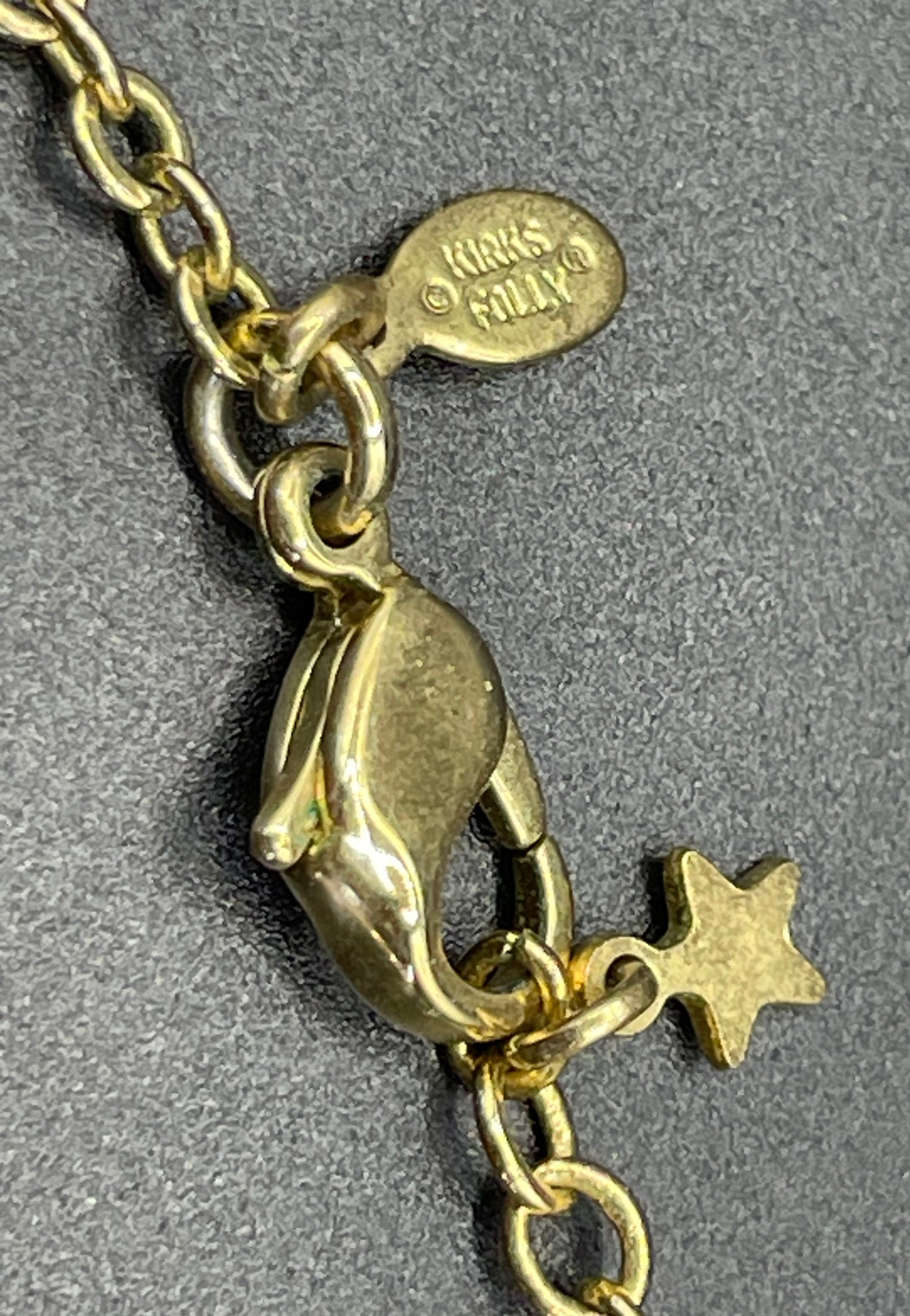 Vintage signed Kirk's Folly angel wing motif pendant necklace and clamper bangle set, in gold tone with aurora borealis AB rhinestones