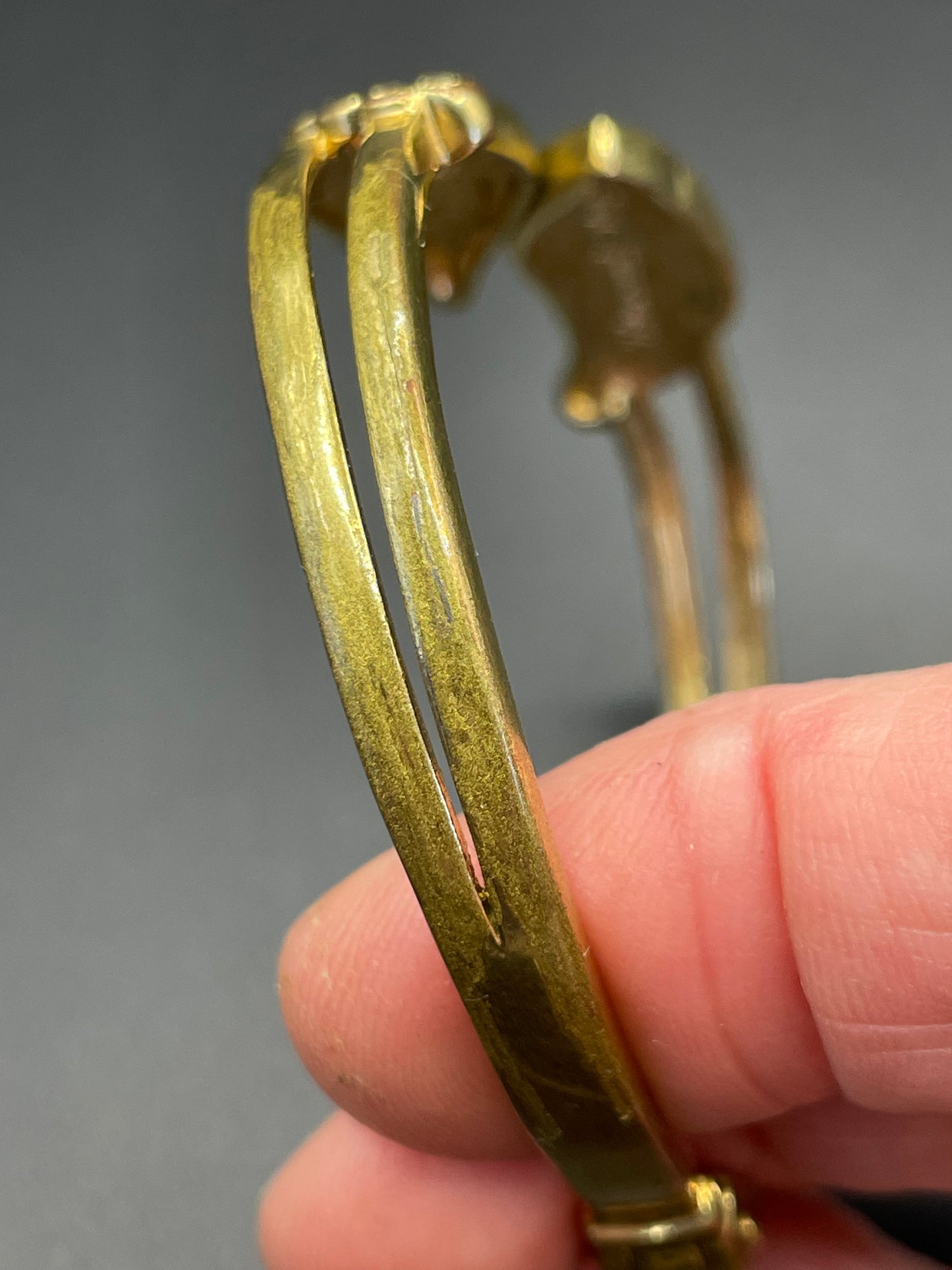 Vintage signed Kirk's Folly angel wing motif pendant necklace and clamper bangle set, in gold tone with aurora borealis AB rhinestones