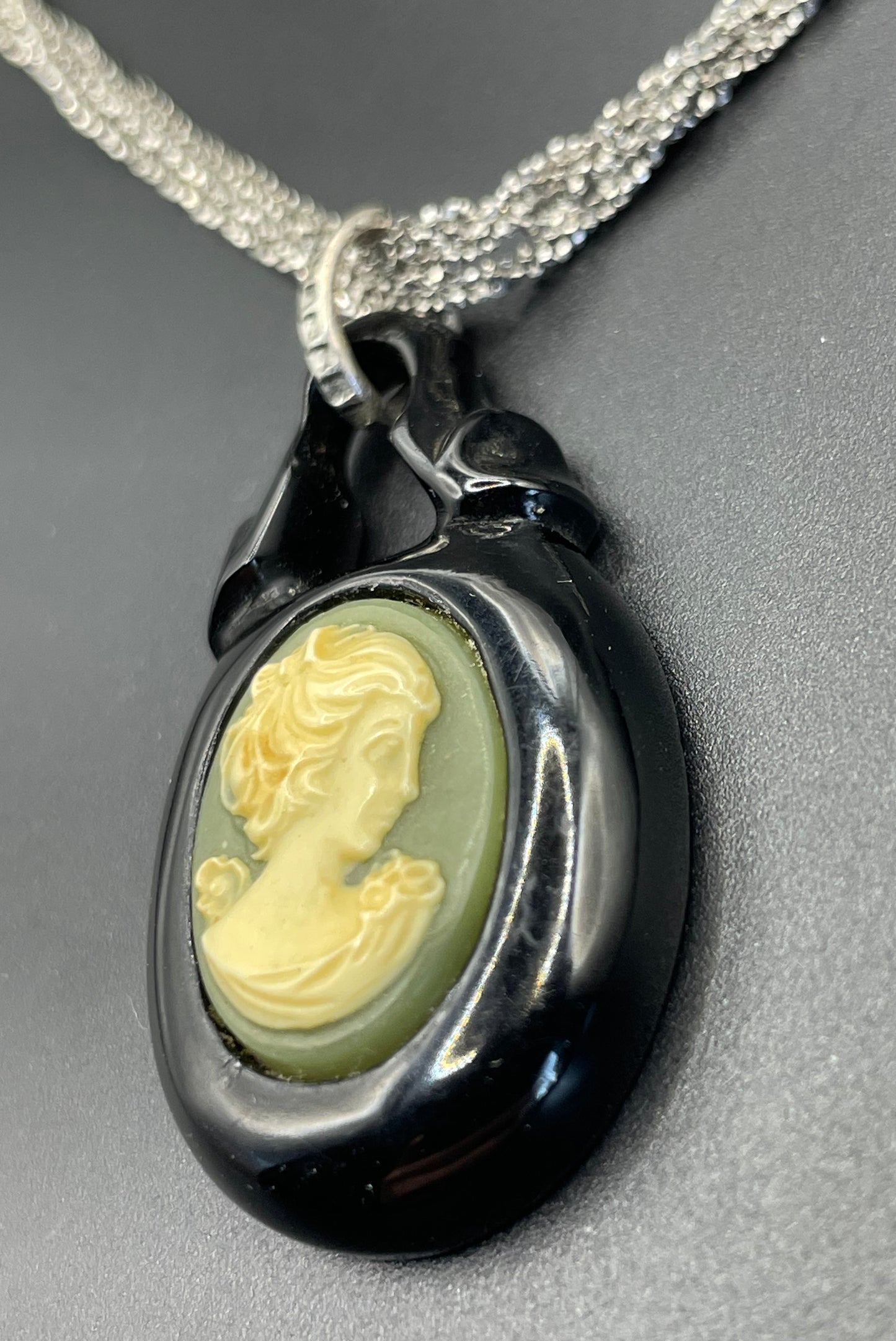 Antique Victorian carved Whitby jet cameo pendant here with a more modern multi-strand 20-inch Italian sterling silver popcorn chain