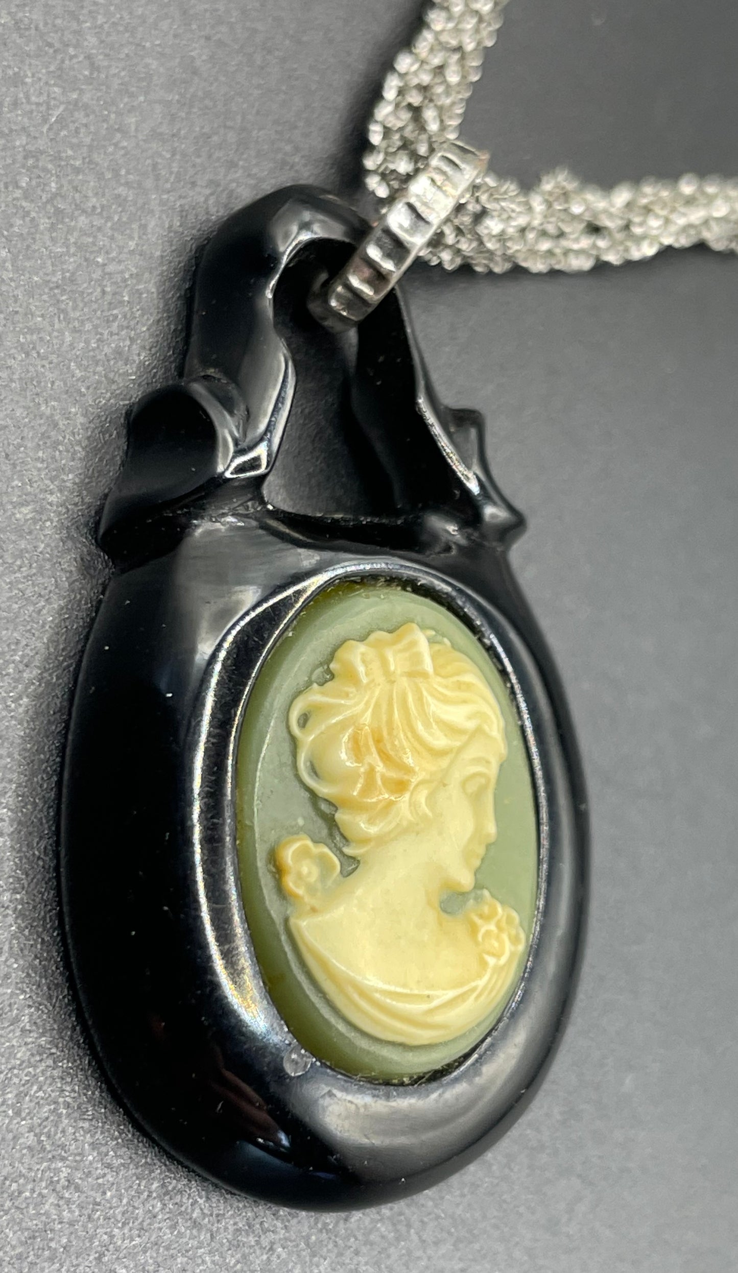 Antique Victorian carved Whitby jet cameo pendant here with a more modern multi-strand 20-inch Italian sterling silver popcorn chain