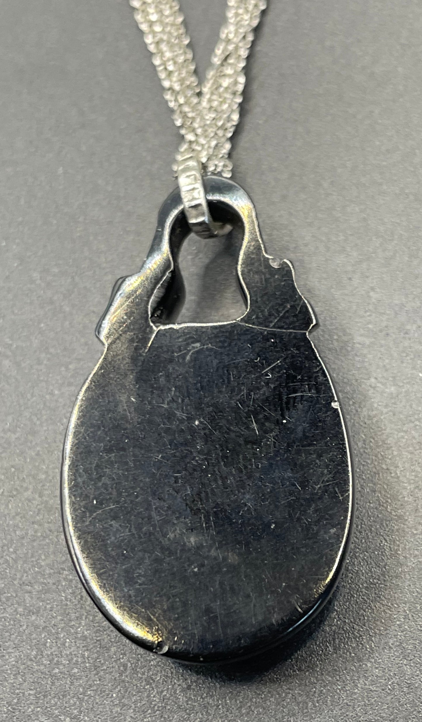 Antique Victorian carved Whitby jet cameo pendant here with a more modern multi-strand 20-inch Italian sterling silver popcorn chain