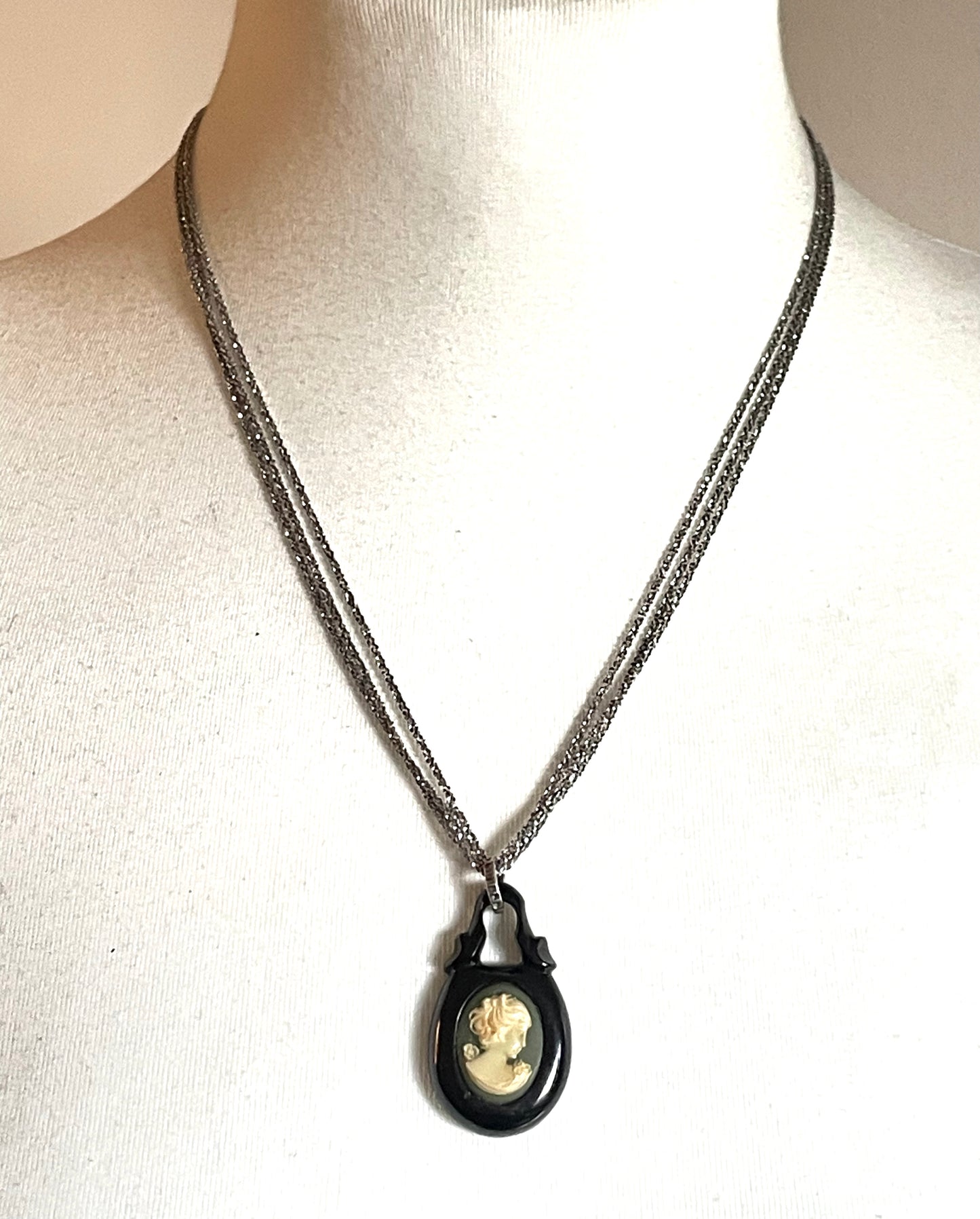 Antique Victorian carved Whitby jet cameo pendant here with a more modern multi-strand 20-inch Italian sterling silver popcorn chain