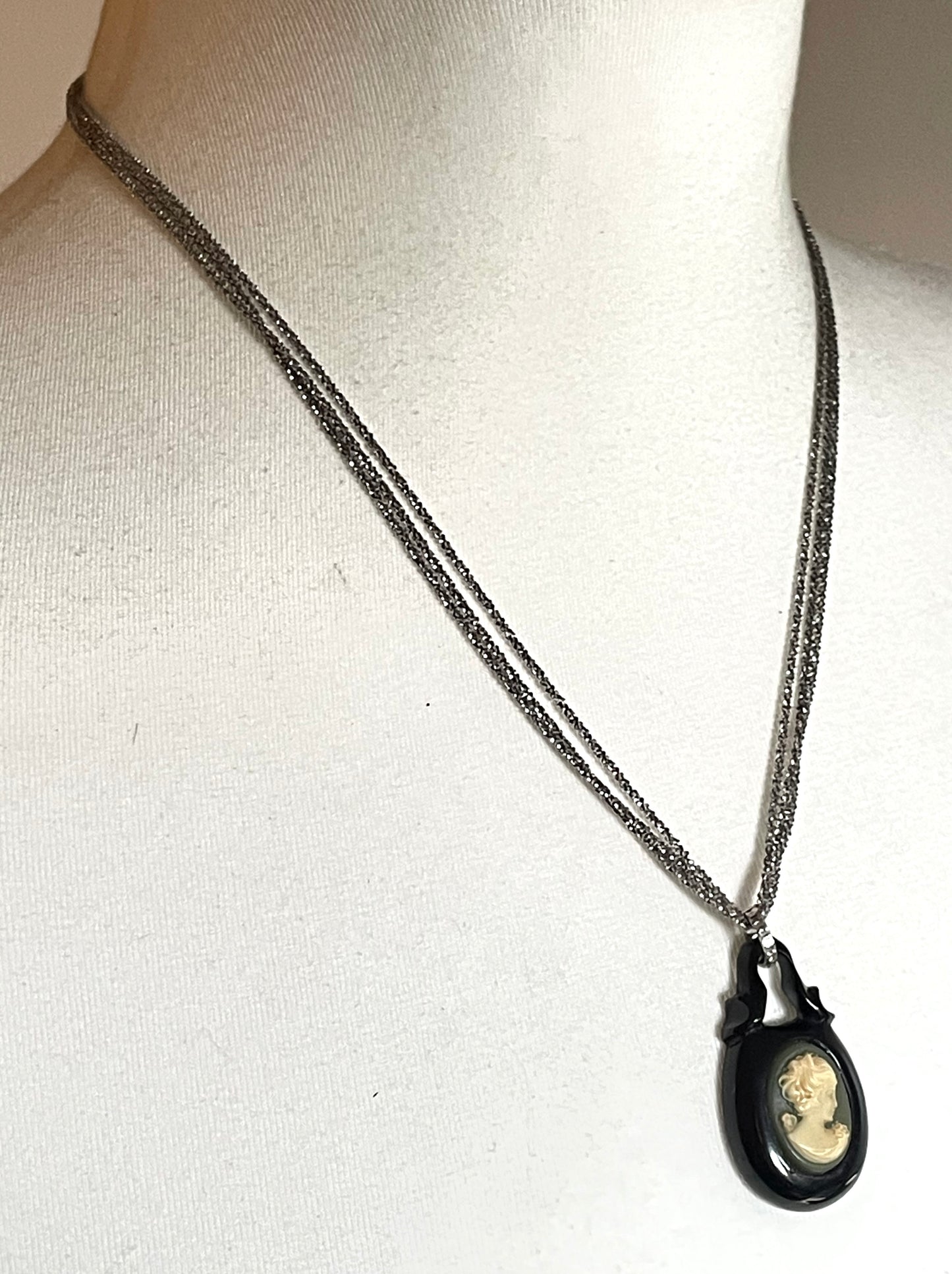Antique Victorian carved Whitby jet cameo pendant here with a more modern multi-strand 20-inch Italian sterling silver popcorn chain