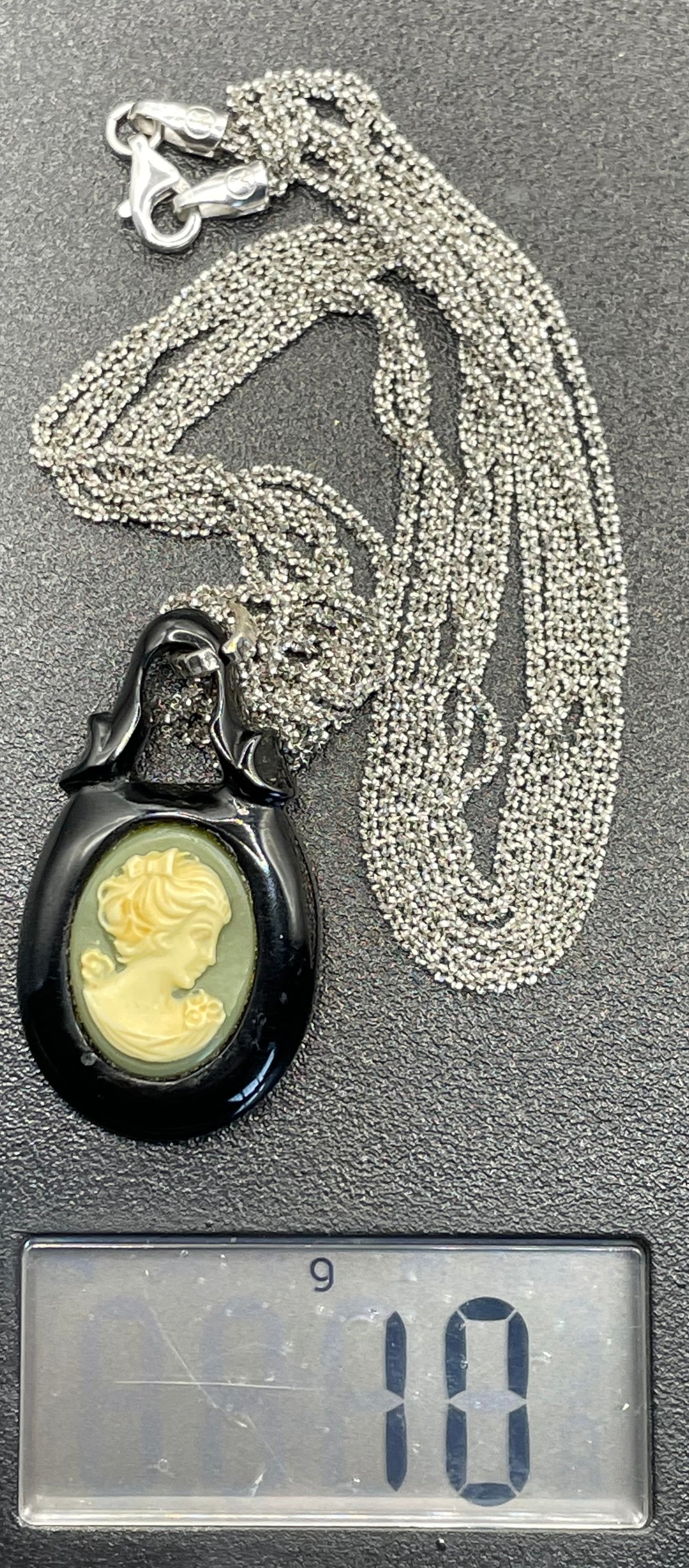 Antique Victorian carved Whitby jet cameo pendant here with a more modern multi-strand 20-inch Italian sterling silver popcorn chain