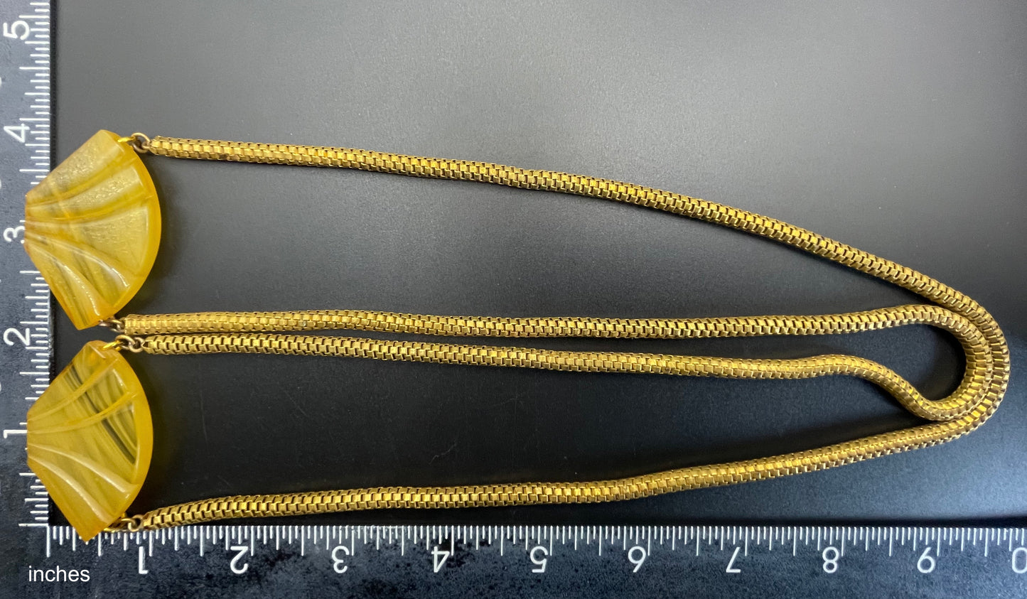 Vintage Art Deco marbled yellow galalith buckle necklace with double strand antique gold tone machine age snake chains, front fastening