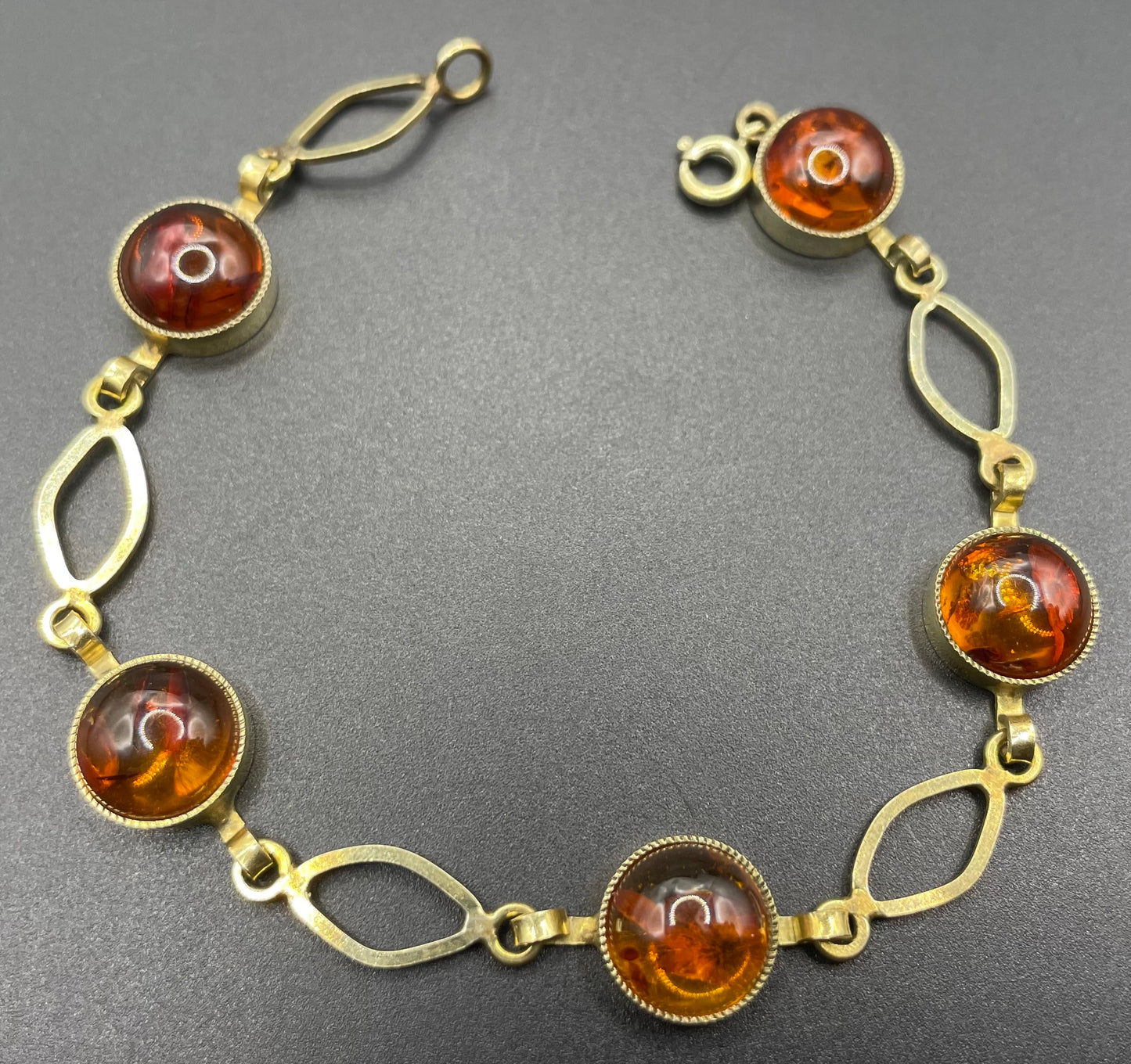 Vintage Art Deco 1920s / 1930s amber gemstone cabochon and gold tone bracelet, stamped AMR