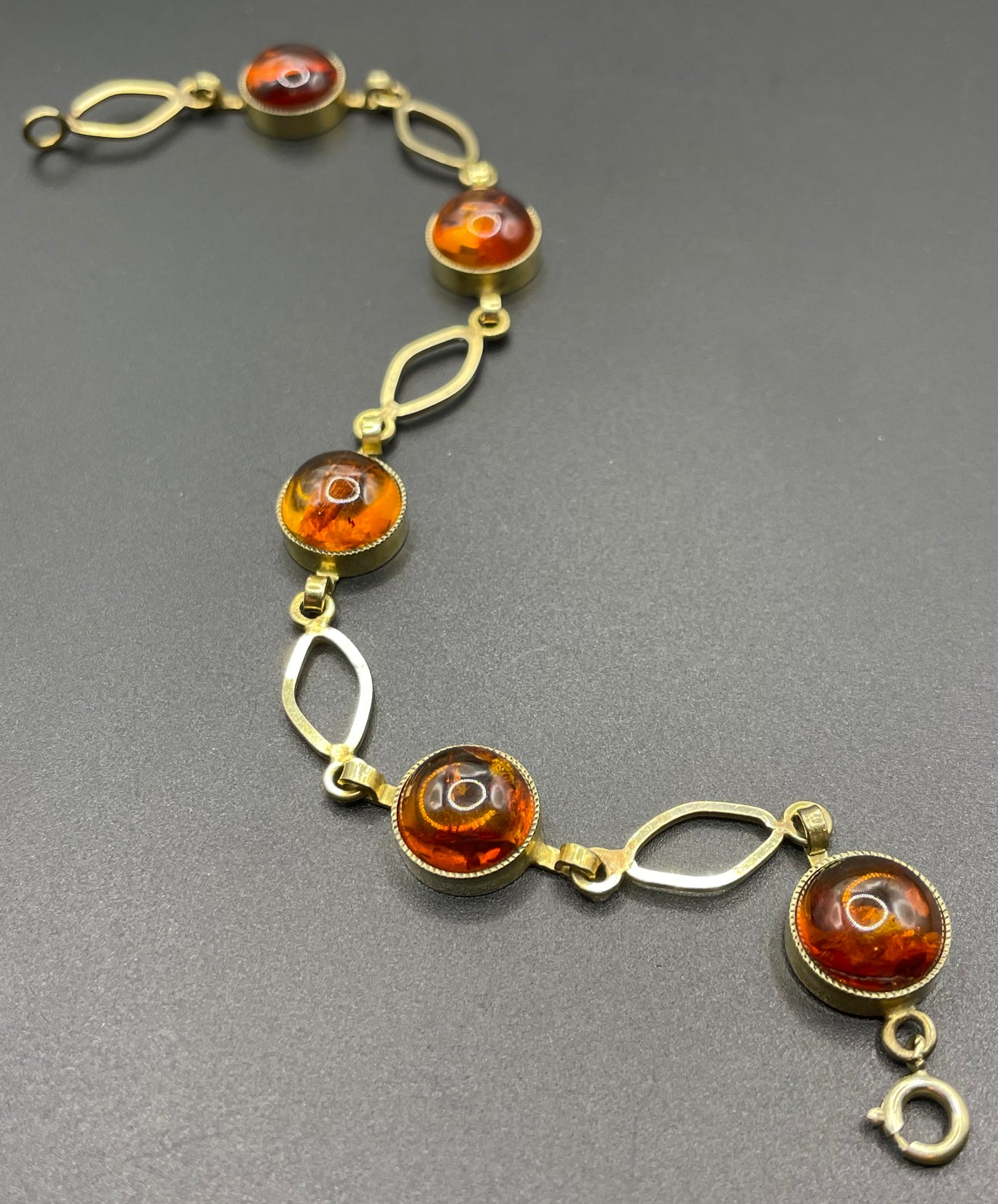 Vintage Art Deco 1920s / 1930s amber gemstone cabochon and gold tone bracelet, stamped AMR