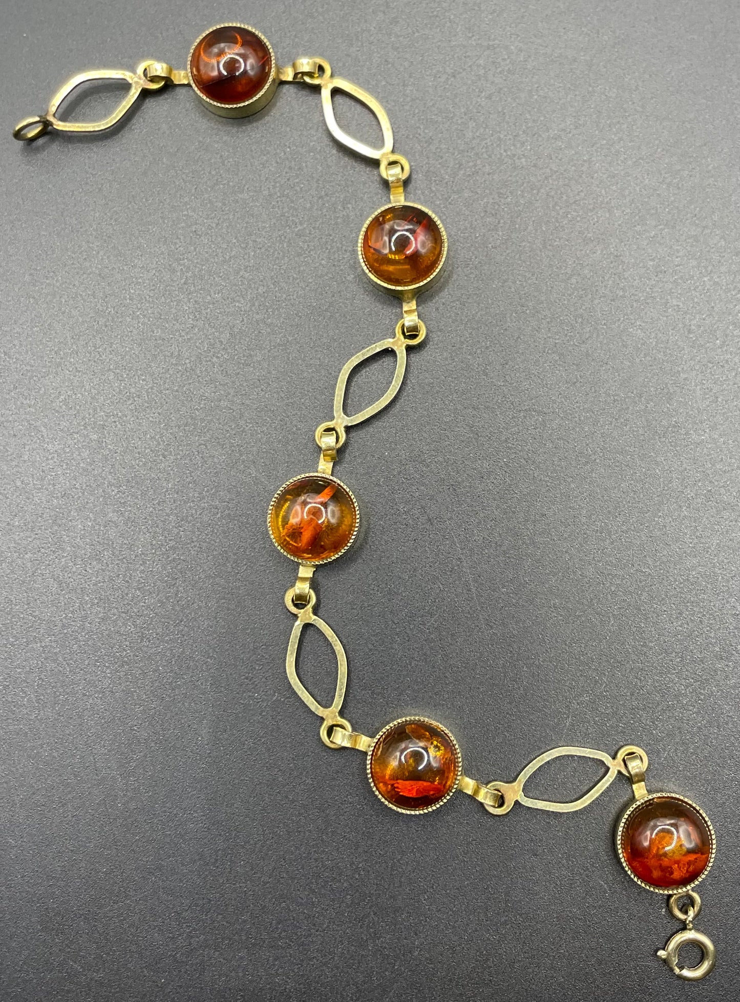 Vintage Art Deco 1920s / 1930s amber gemstone cabochon and gold tone bracelet, stamped AMR