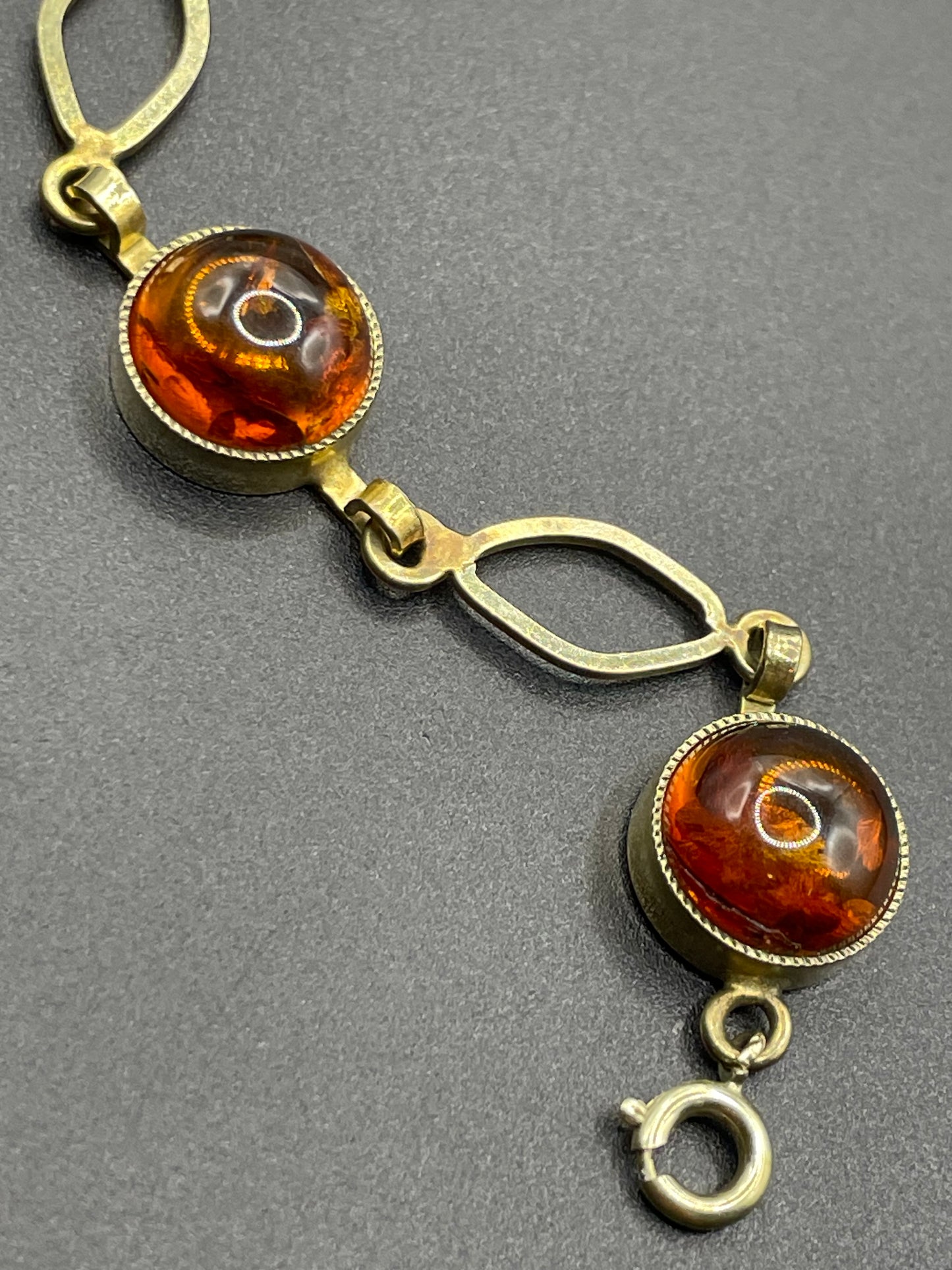 Vintage Art Deco 1920s / 1930s amber gemstone cabochon and gold tone bracelet, stamped AMR