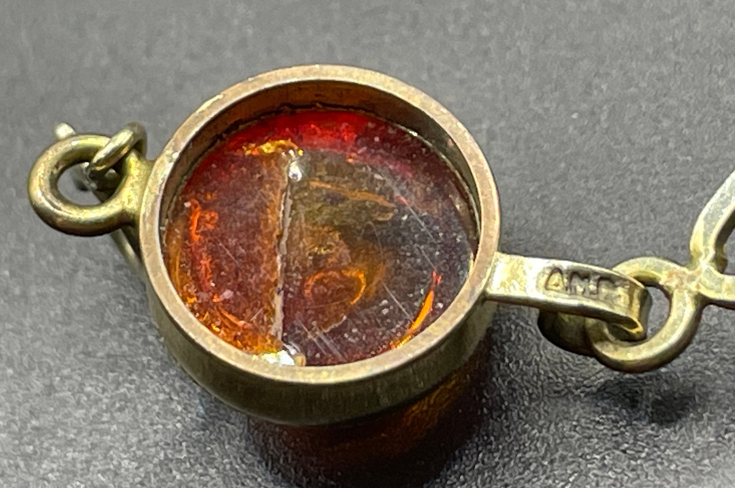 Vintage Art Deco 1920s / 1930s amber gemstone cabochon and gold tone bracelet, stamped AMR