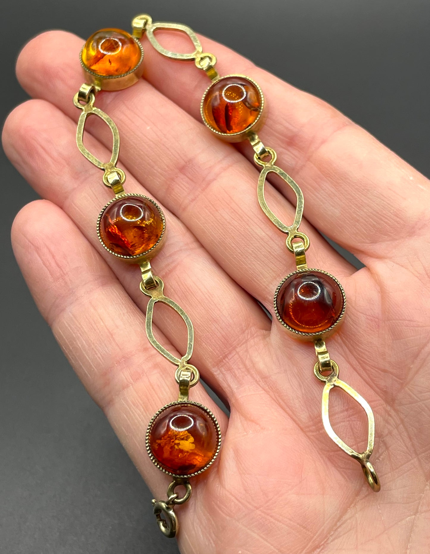Vintage Art Deco 1920s / 1930s amber gemstone cabochon and gold tone bracelet, stamped AMR