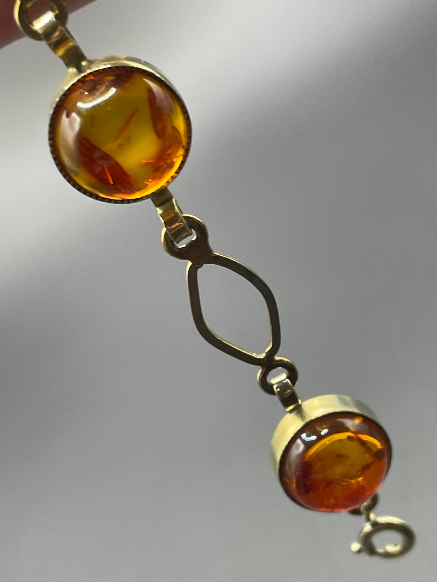 Vintage Art Deco 1920s / 1930s amber gemstone cabochon and gold tone bracelet, stamped AMR
