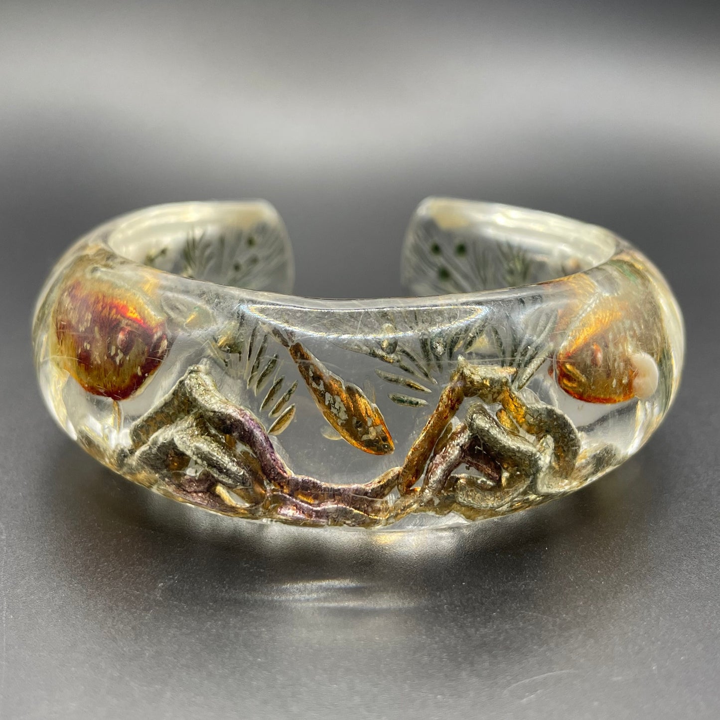 Rare Dunhill Aquarium reverse carved lucite cuff bangle, companion to the aquarium lighters from around 1950