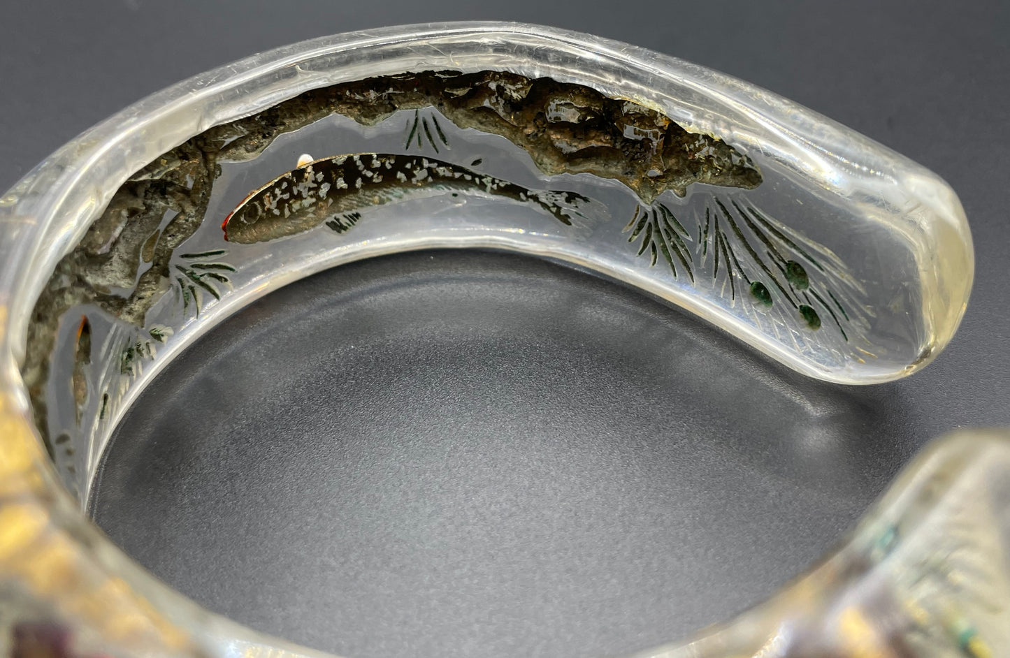 Rare Dunhill Aquarium reverse carved lucite cuff bangle, companion to the aquarium lighters from around 1950