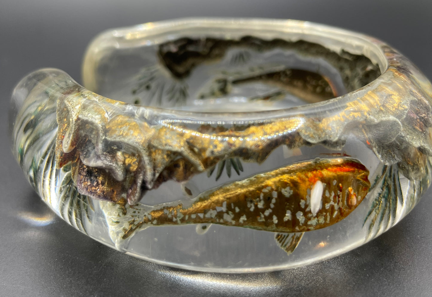 Rare Dunhill Aquarium reverse carved lucite cuff bangle, companion to the aquarium lighters from around 1950