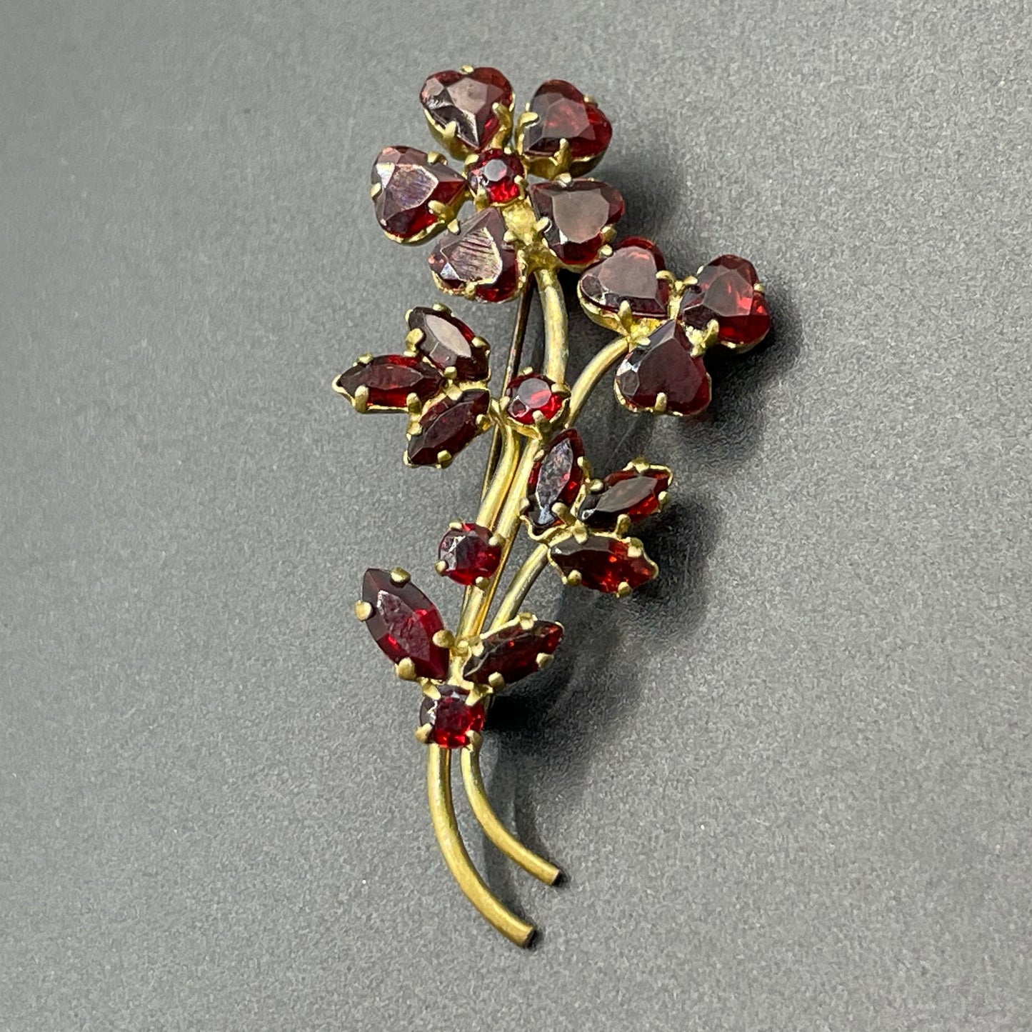 Vintage Art Deco Czech red garnet glass flower bouquet brooch, unusual heart-shaped rhinestones, set open-backed in gold tone