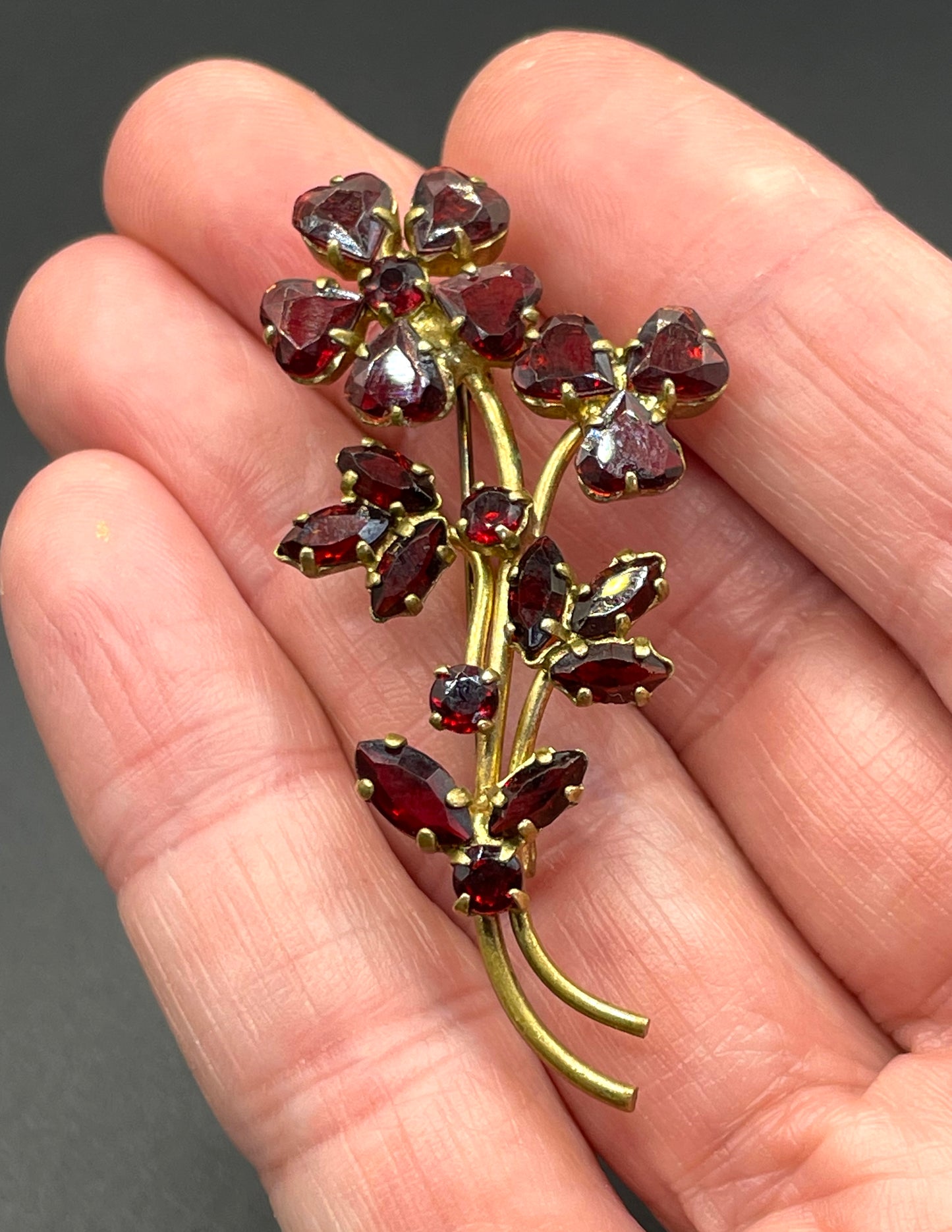 Vintage Art Deco Czech red garnet glass flower bouquet brooch, unusual heart-shaped rhinestones, set open-backed in gold tone