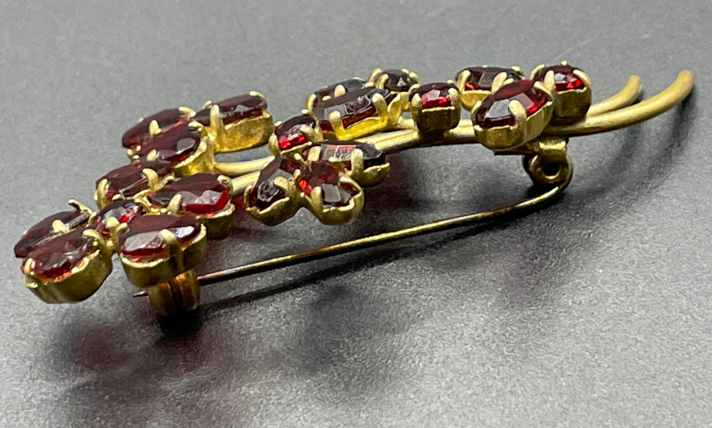 Vintage Art Deco Czech red garnet glass flower bouquet brooch, unusual heart-shaped rhinestones, set open-backed in gold tone