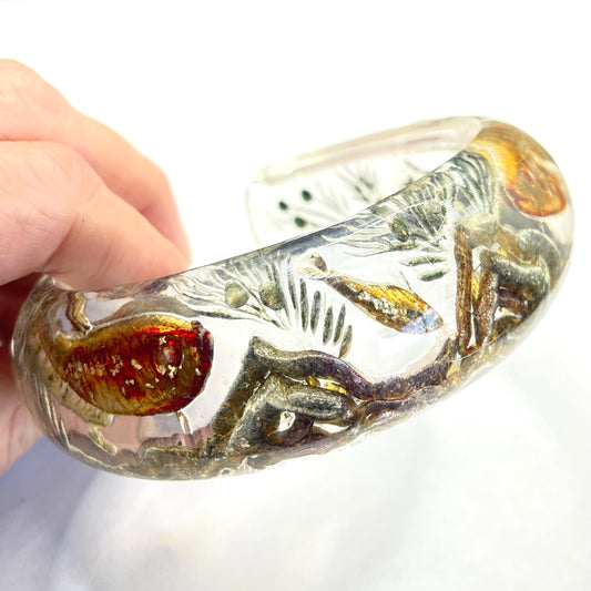 Rare Dunhill Aquarium reverse carved lucite cuff bangle, companion to the aquarium lighters from around 1950