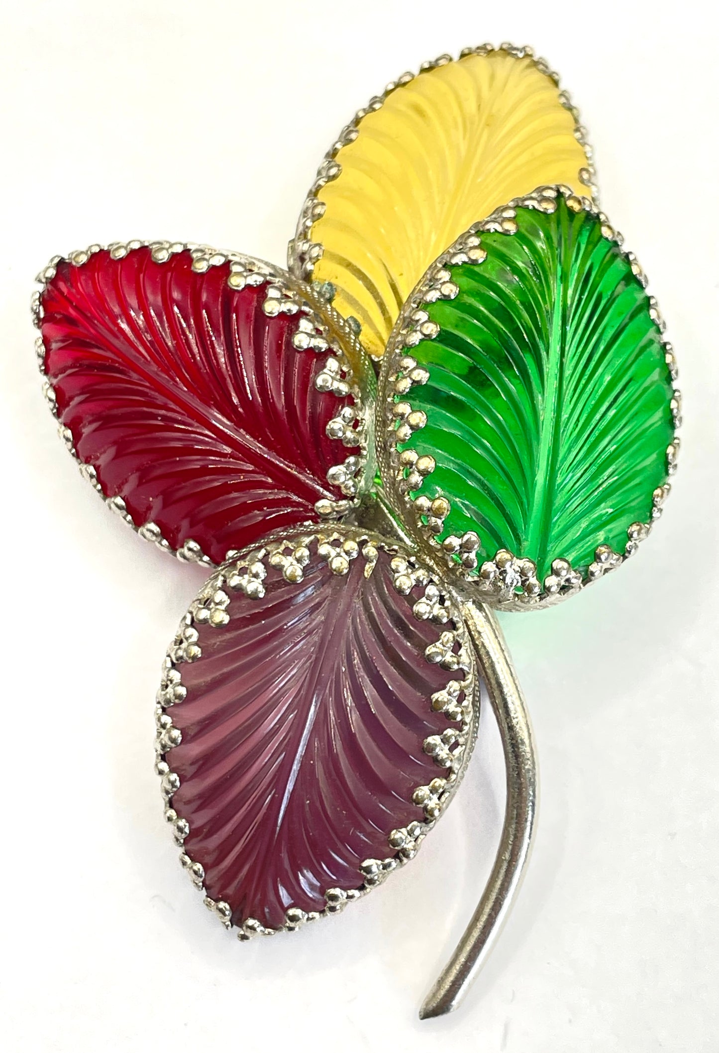 Vintage unsigned Schreiner ? pressed glass cabochon leaf brooch set in silver tone, vibrant red, yellow, green and purple crystals