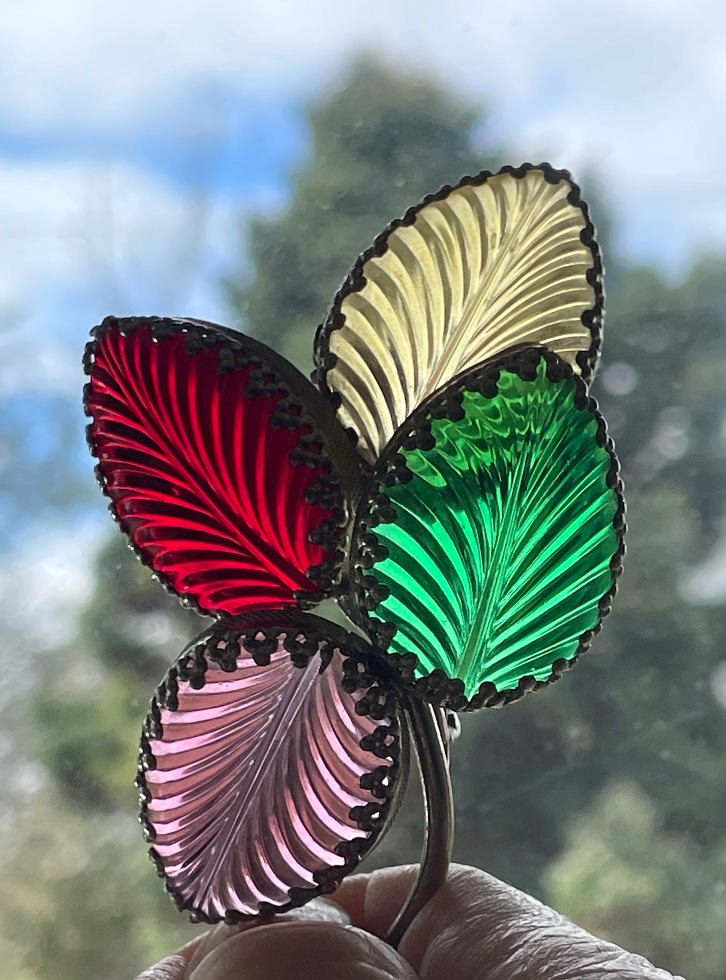 Vintage unsigned Schreiner ? pressed glass cabochon leaf brooch set in silver tone, vibrant red, yellow, green and purple crystals