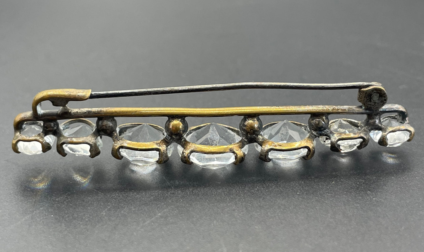 Vintage Art Deco bezel set clear crystal riviere rhinestone bar brooch, open-backed rhinestones in antique gold tone