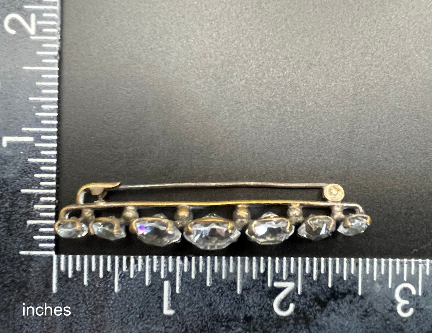 Vintage Art Deco bezel set clear crystal riviere rhinestone bar brooch, open-backed rhinestones in antique gold tone