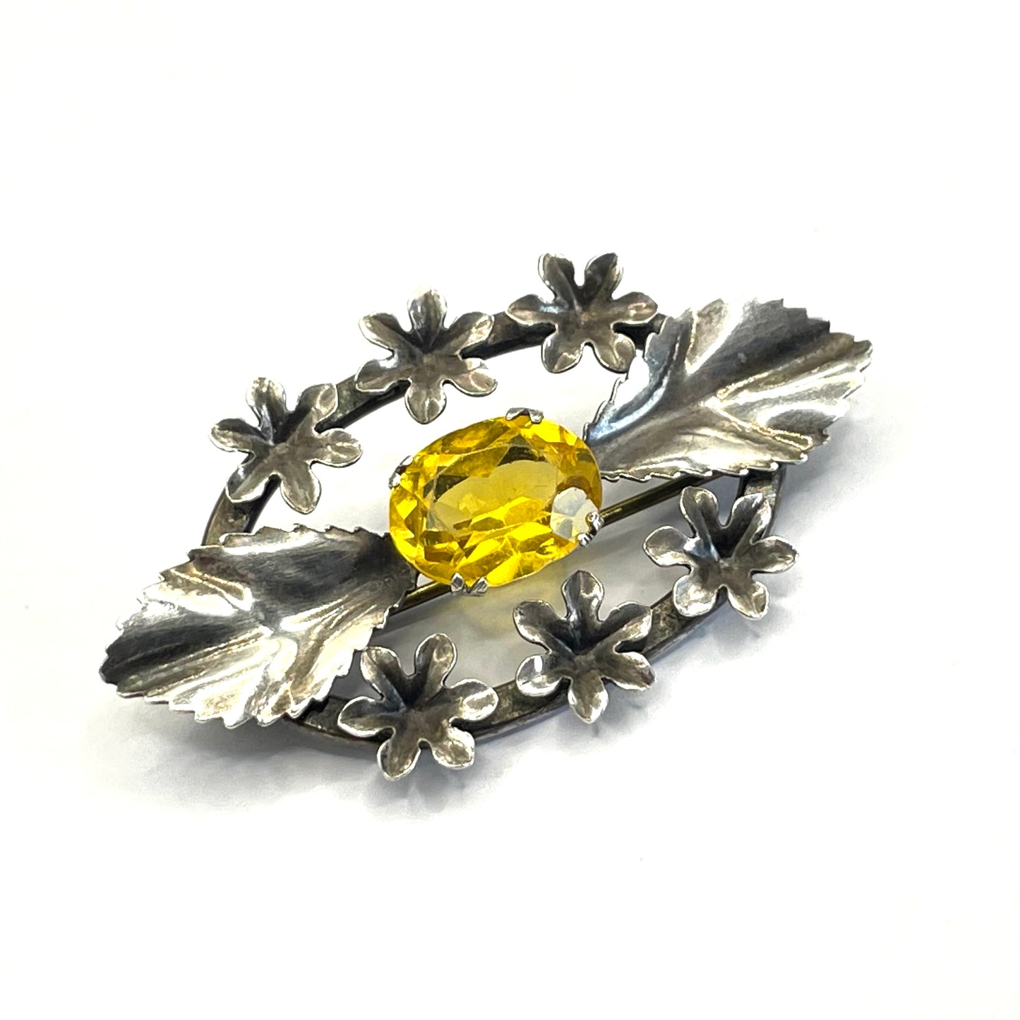 Antique sterling silver and large citrine yellow paste rhinestone brooch, pretty flower and leaf design, stamped 'SILVER', weighs 8 grams
