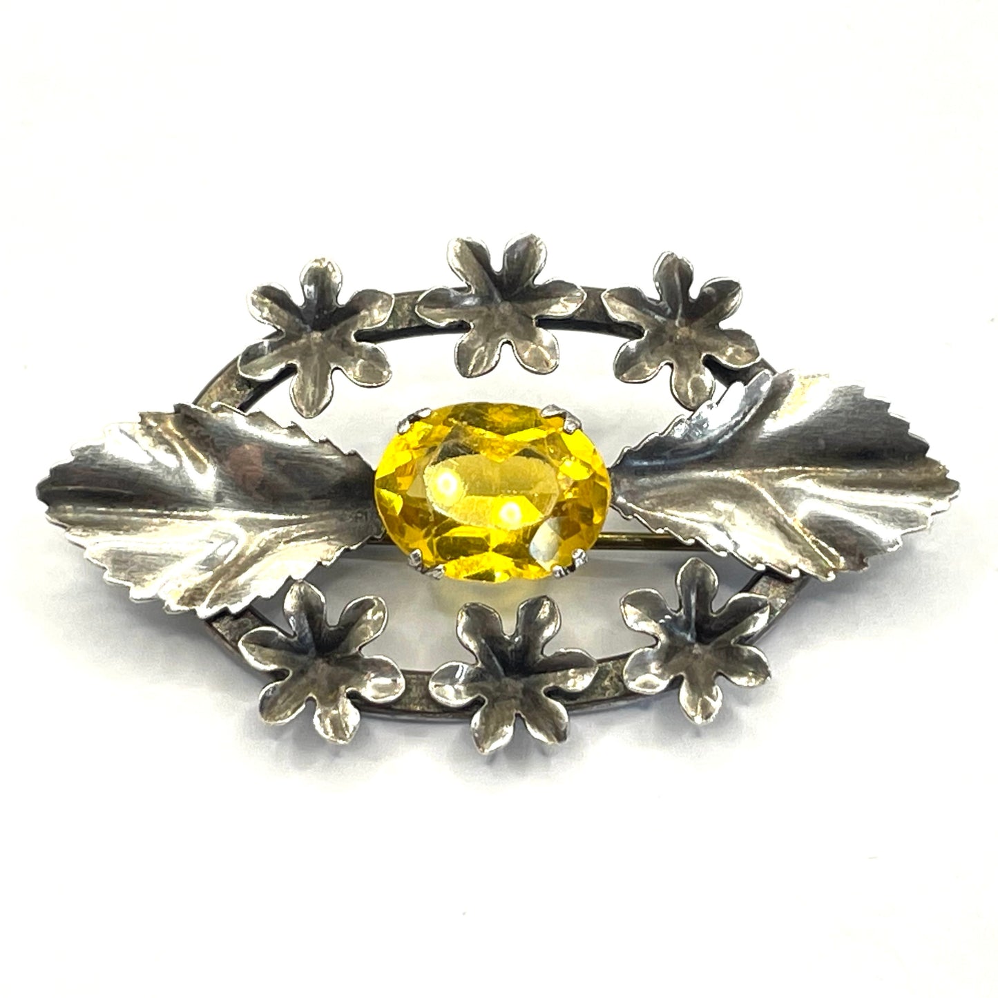 Antique sterling silver and large citrine yellow paste rhinestone brooch, pretty flower and leaf design, stamped 'SILVER', weighs 8 grams