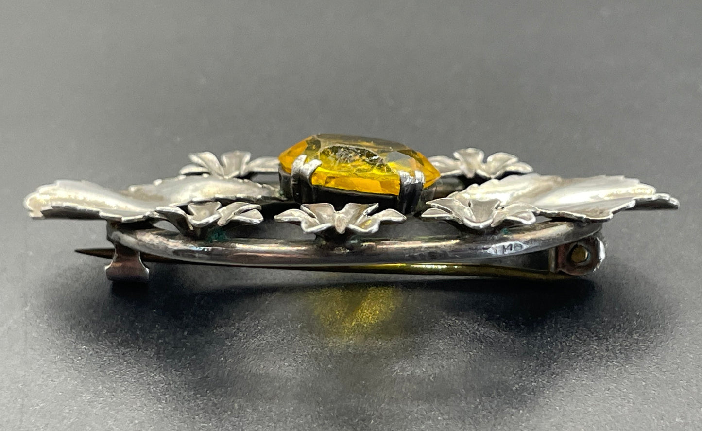 Antique sterling silver and large citrine yellow paste rhinestone brooch, pretty flower and leaf design, stamped 'SILVER', weighs 8 grams