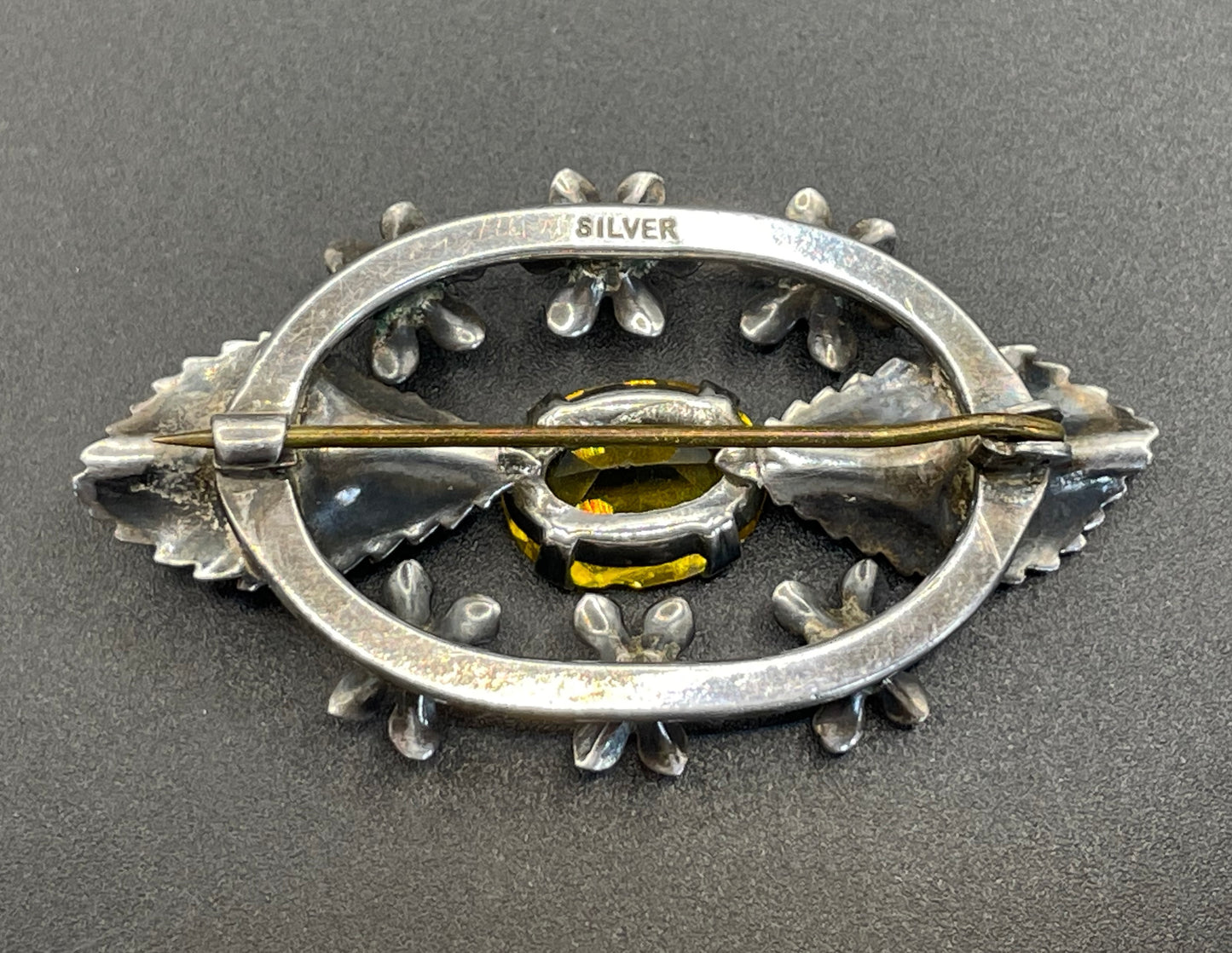 Antique sterling silver and large citrine yellow paste rhinestone brooch, pretty flower and leaf design, stamped 'SILVER', weighs 8 grams