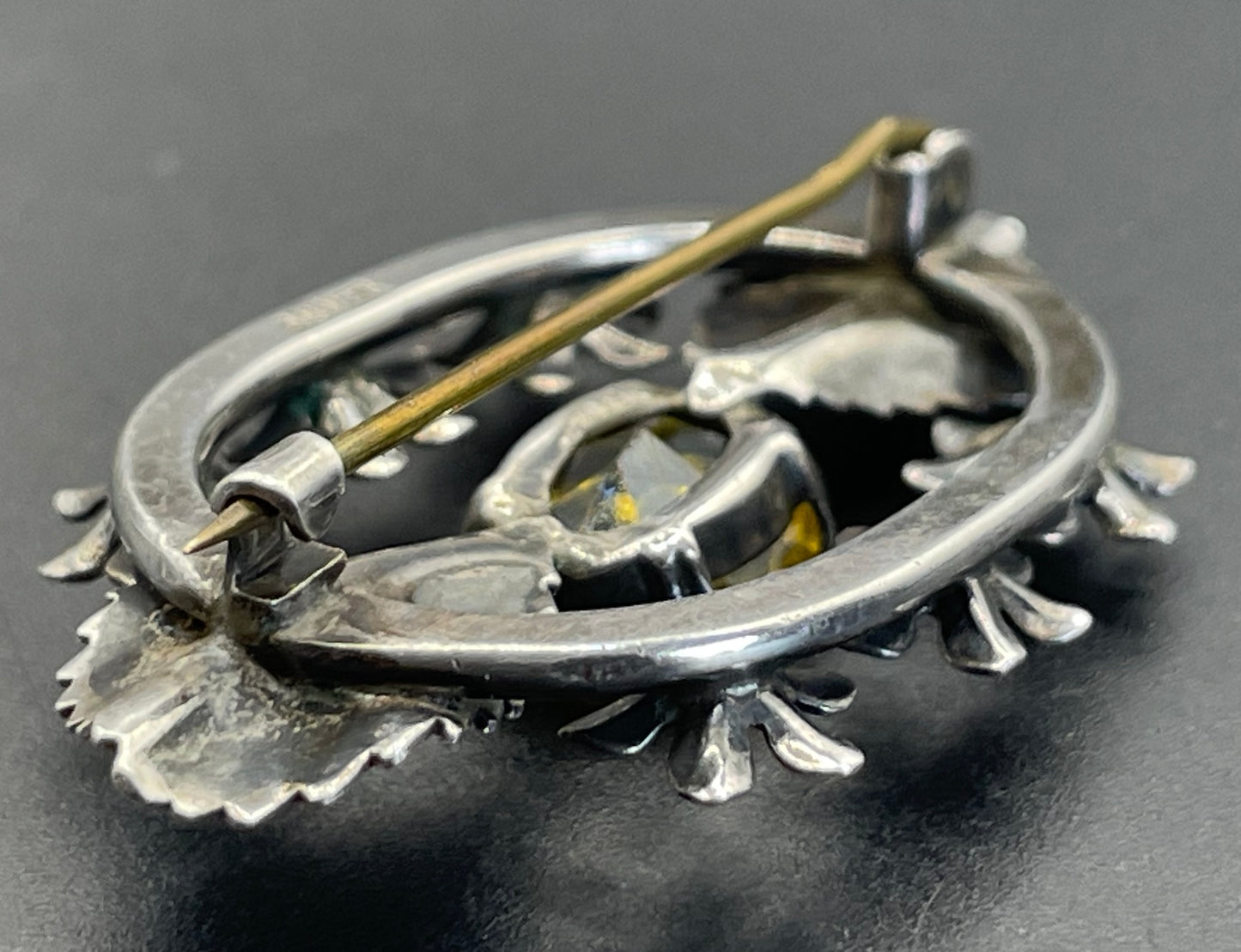 Antique sterling silver and large citrine yellow paste rhinestone brooch, pretty flower and leaf design, stamped 'SILVER', weighs 8 grams